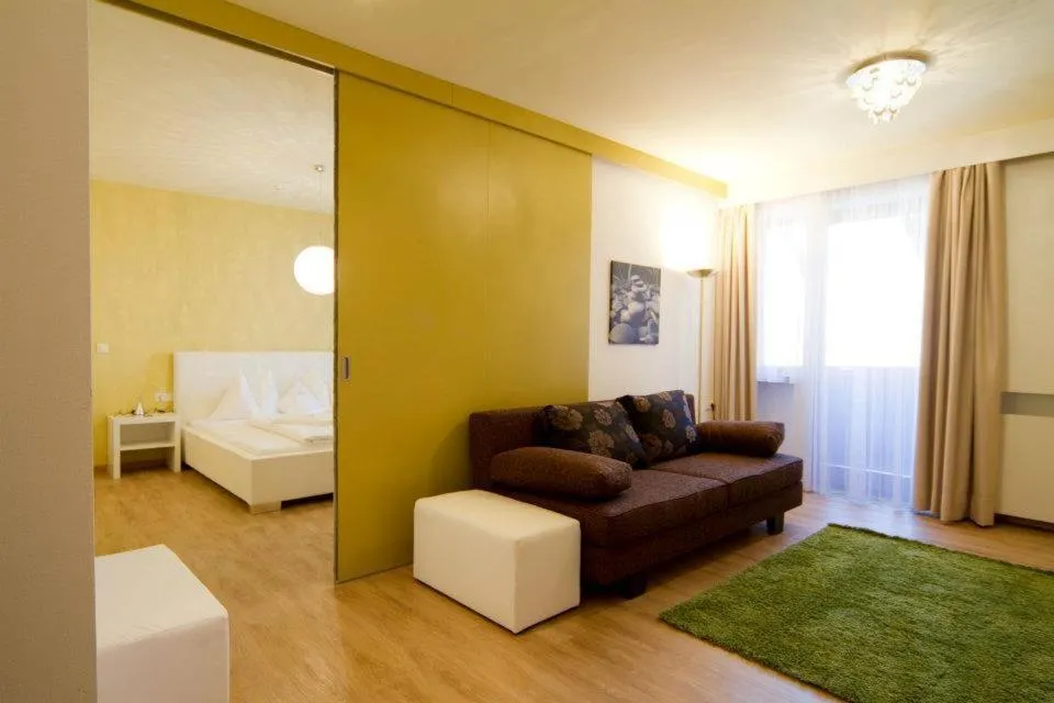 Living room, Bed in Felderer Boutiquehotel B&B