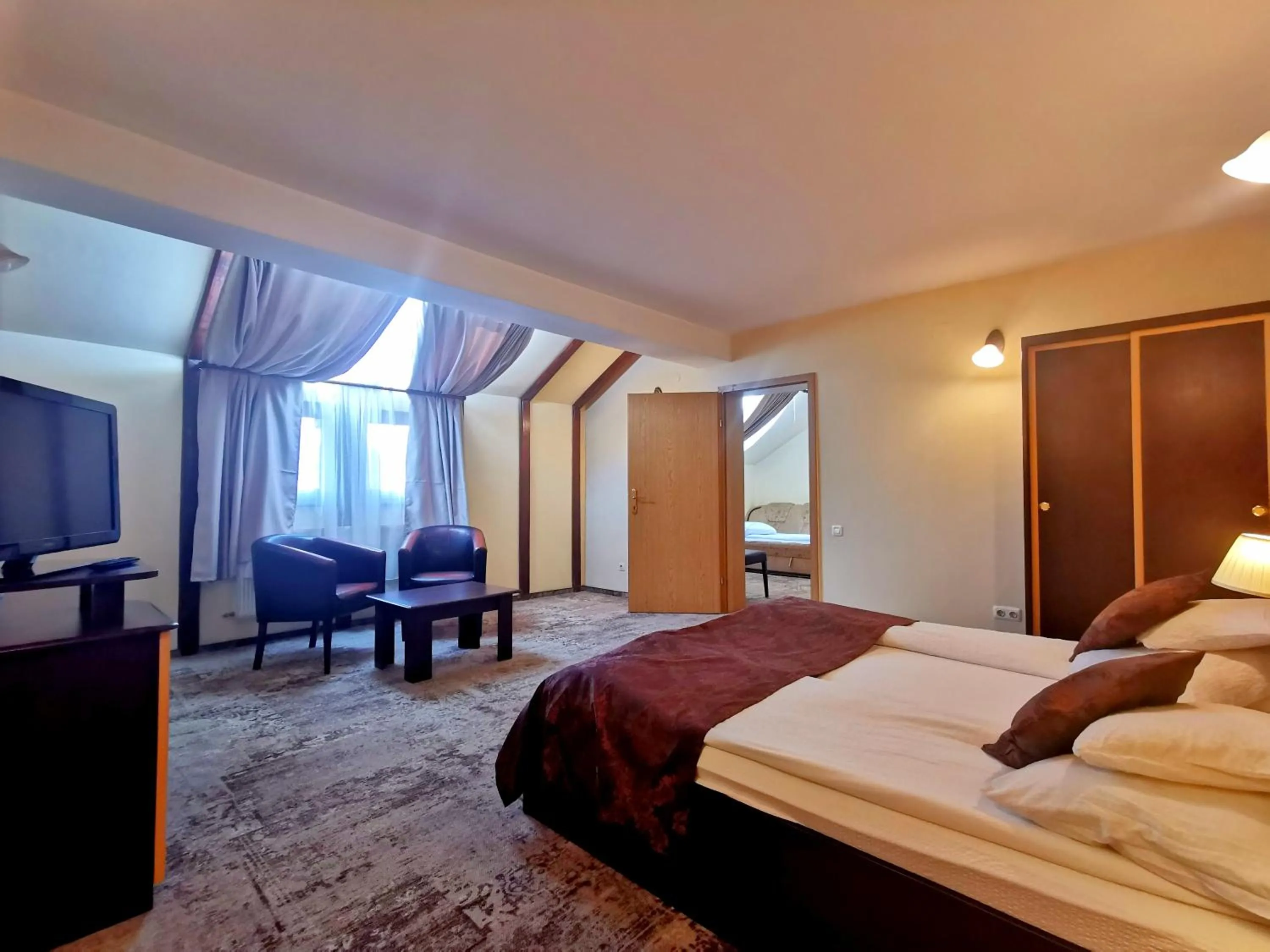 Bed in Pensiunea Ambient