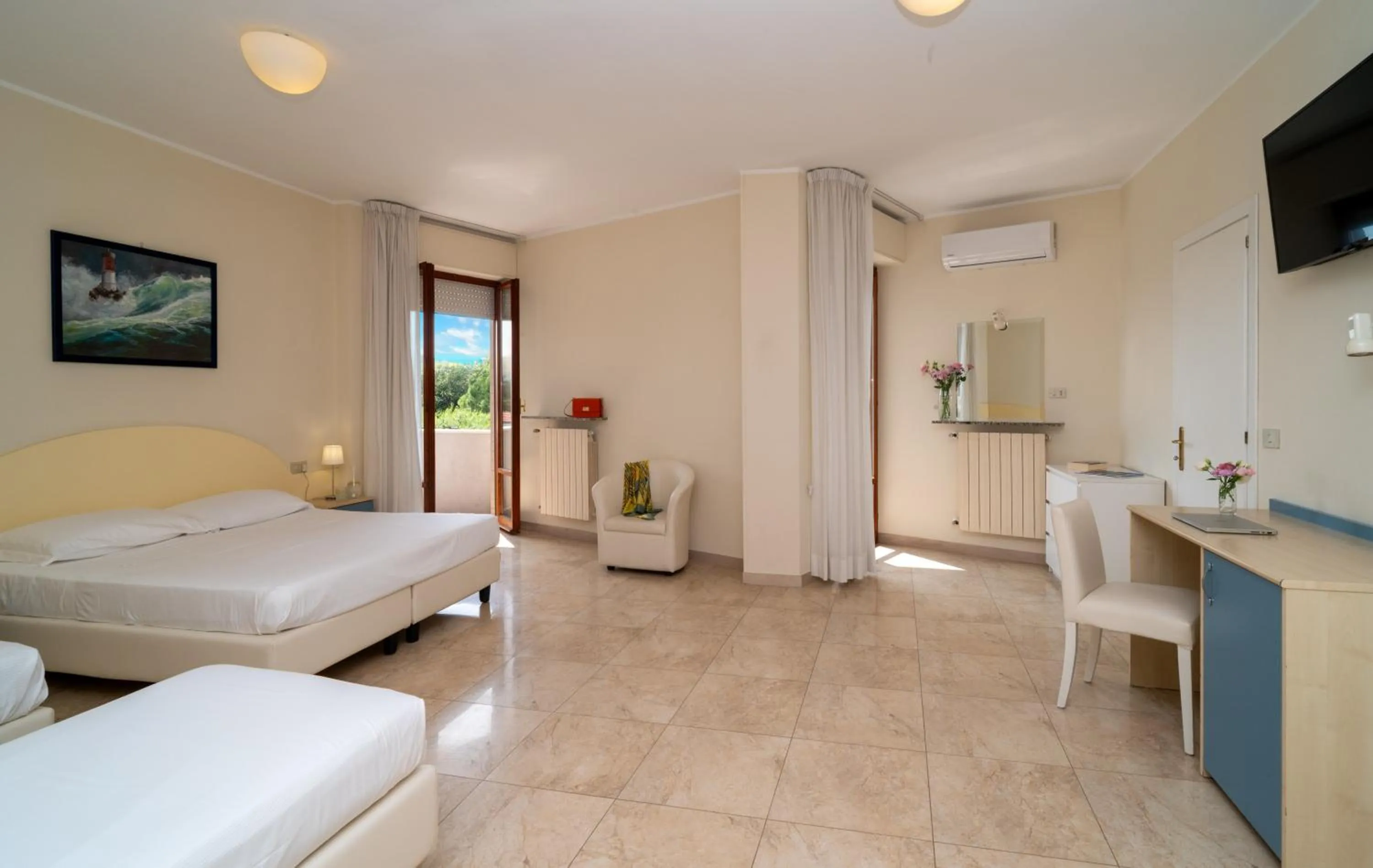 Bed in Hotel Riviera