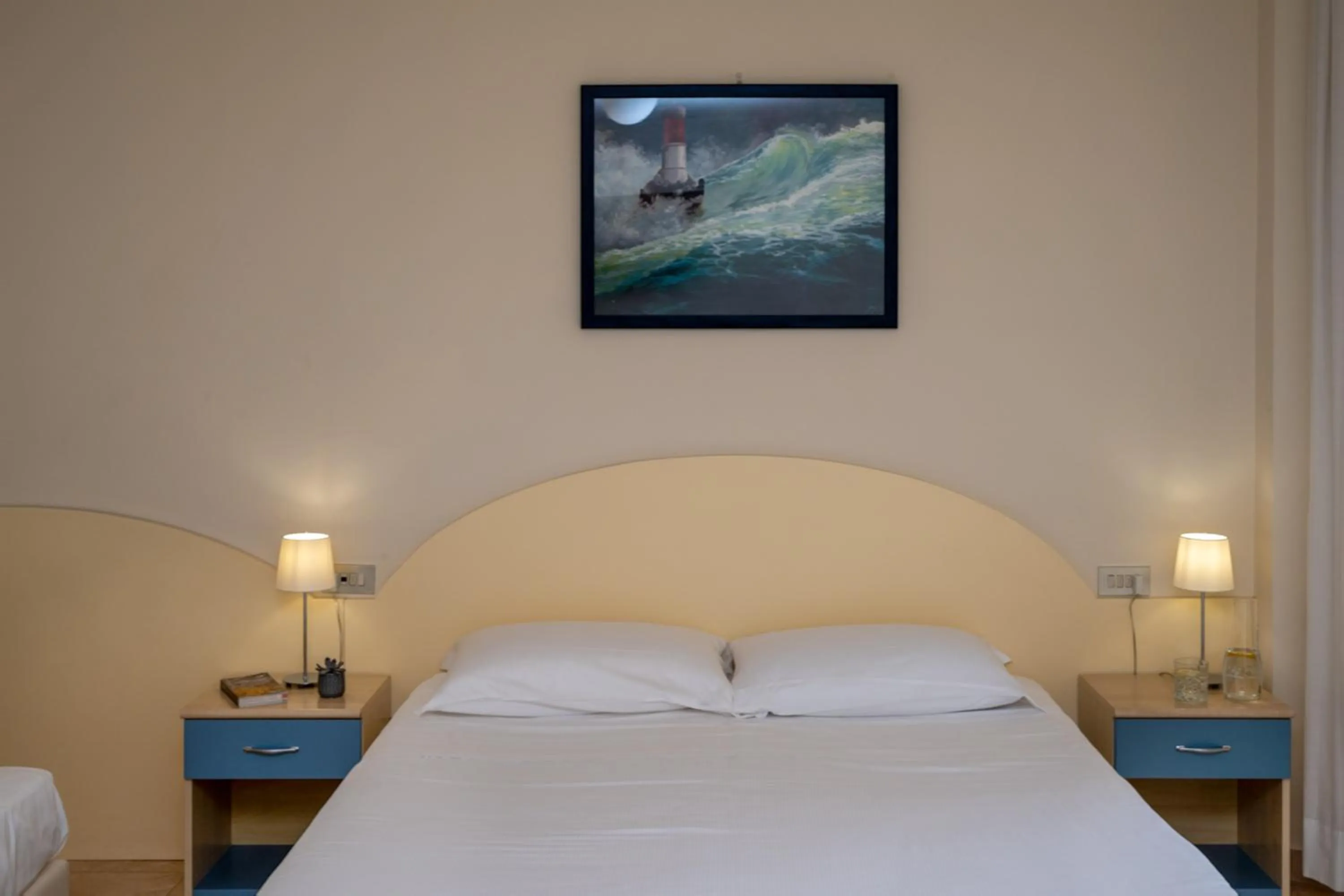 Bed in Hotel Riviera