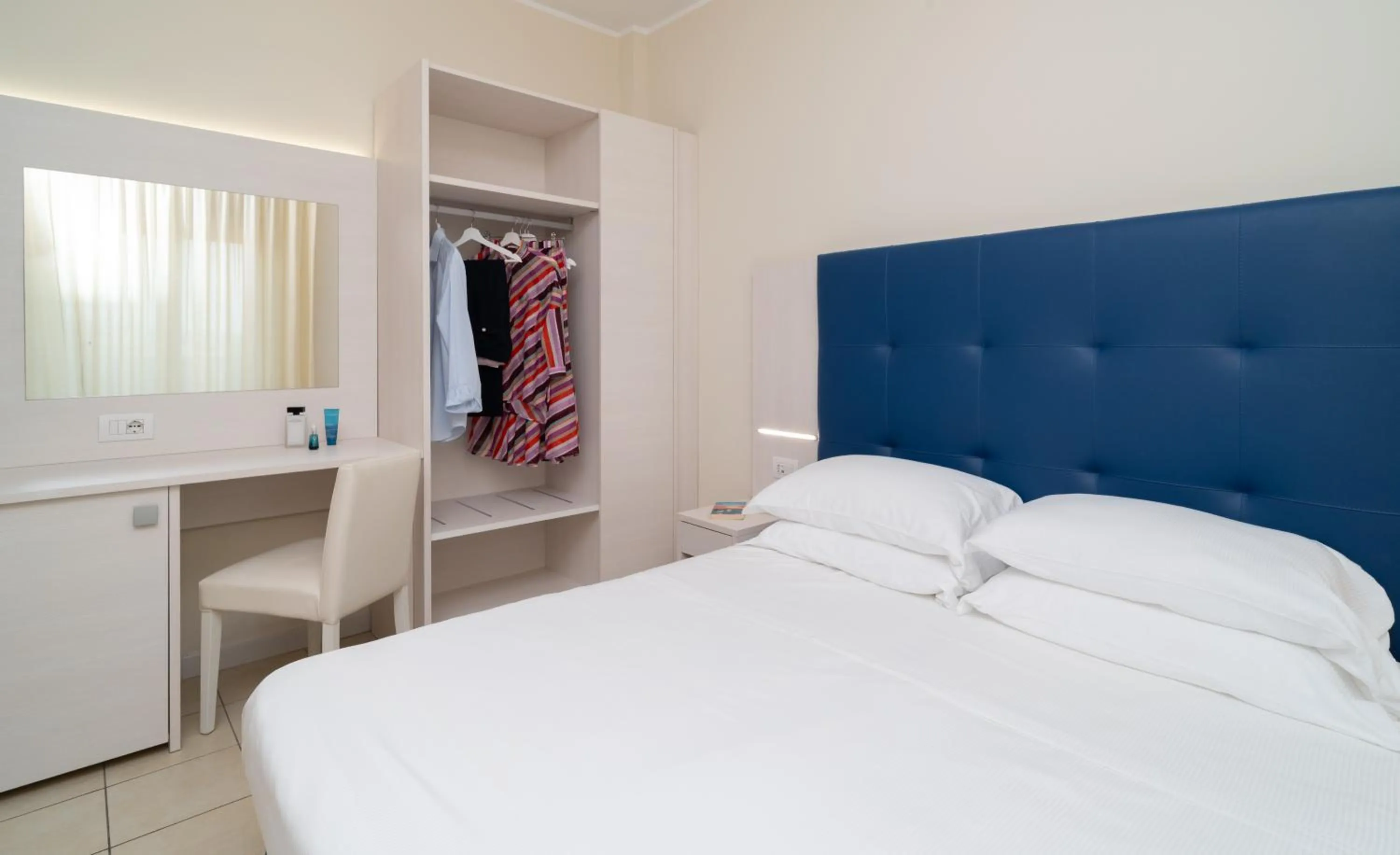 Bed in Hotel Riviera