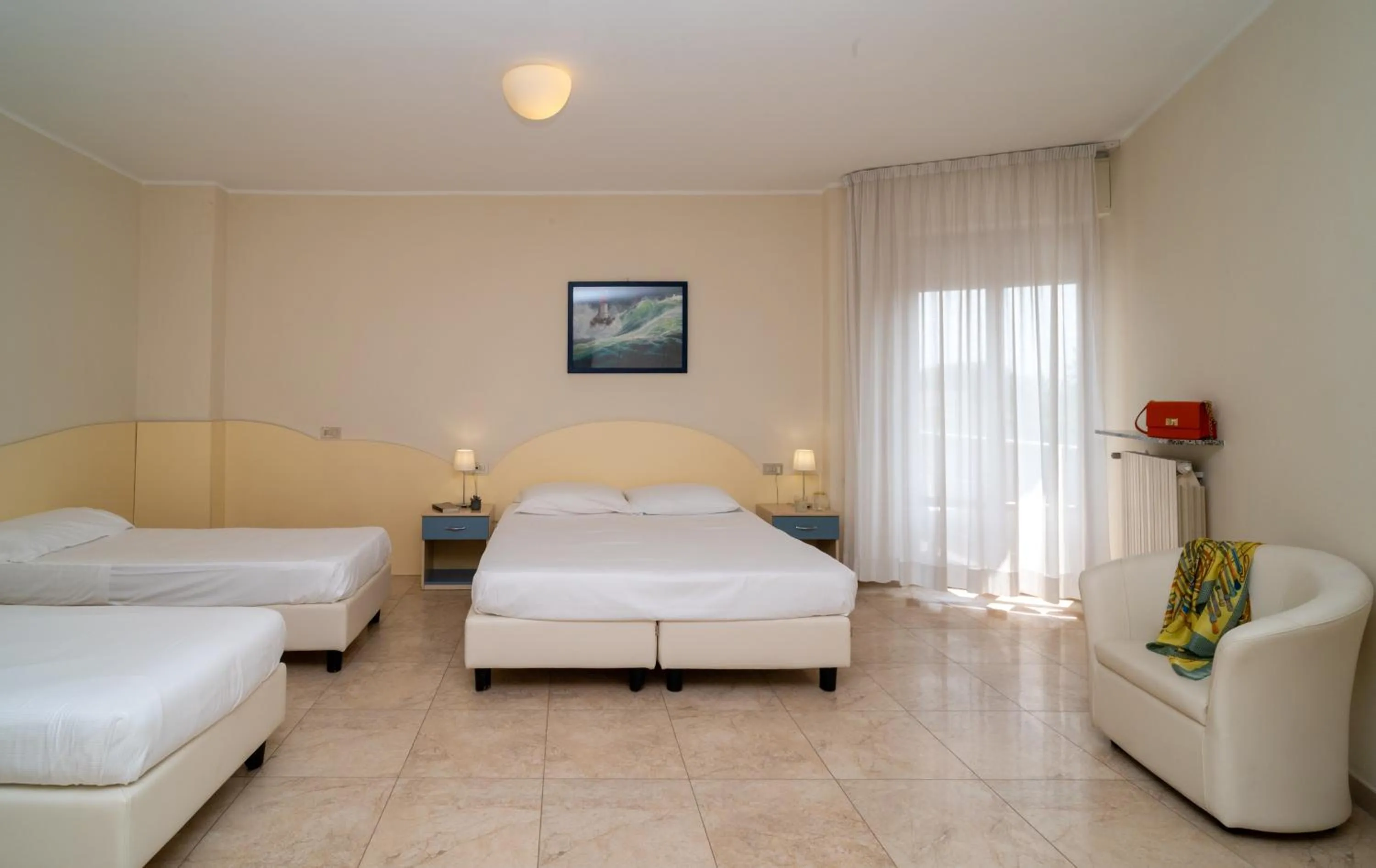 Bed in Hotel Riviera