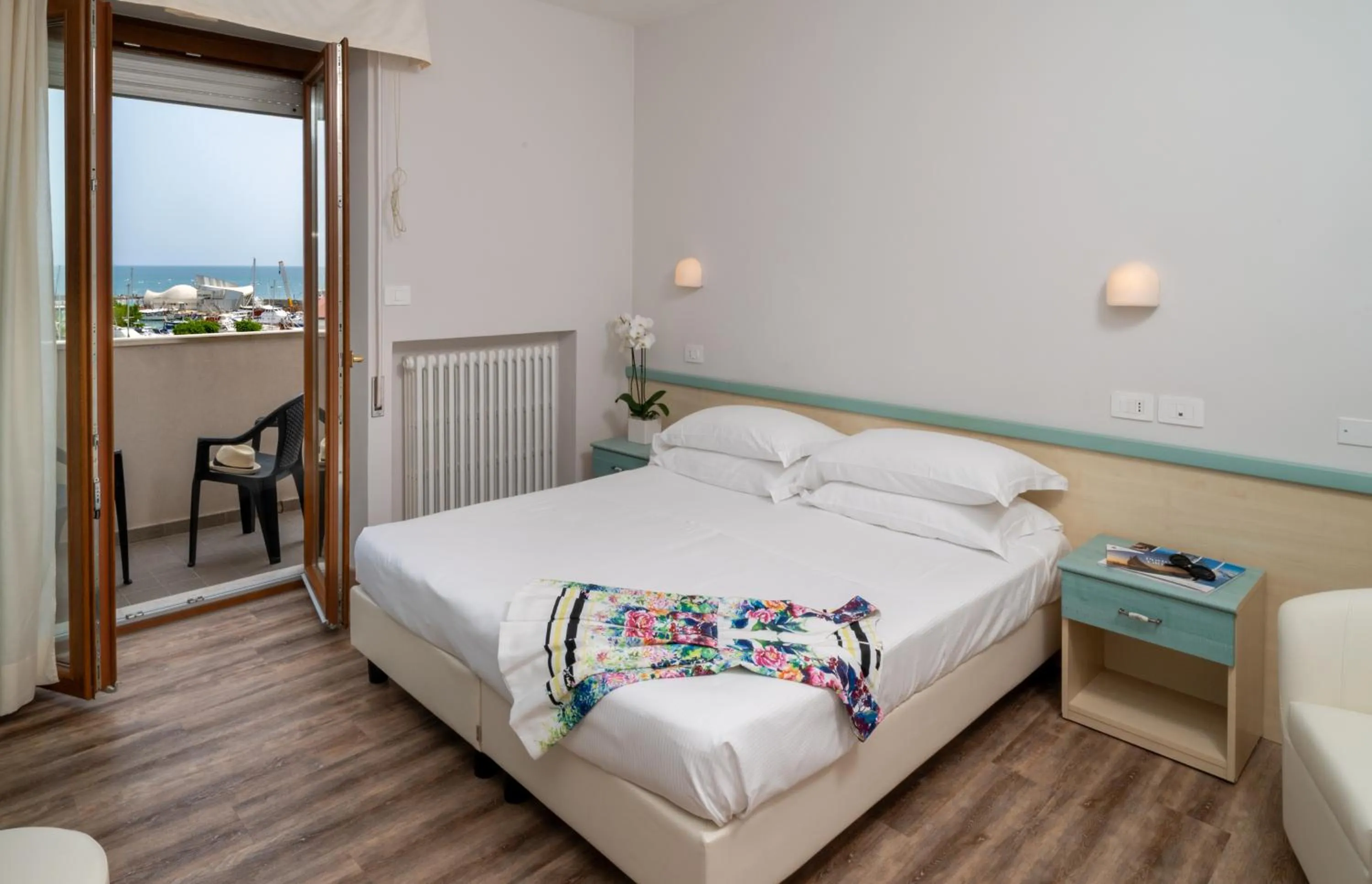 Bed in Hotel Riviera