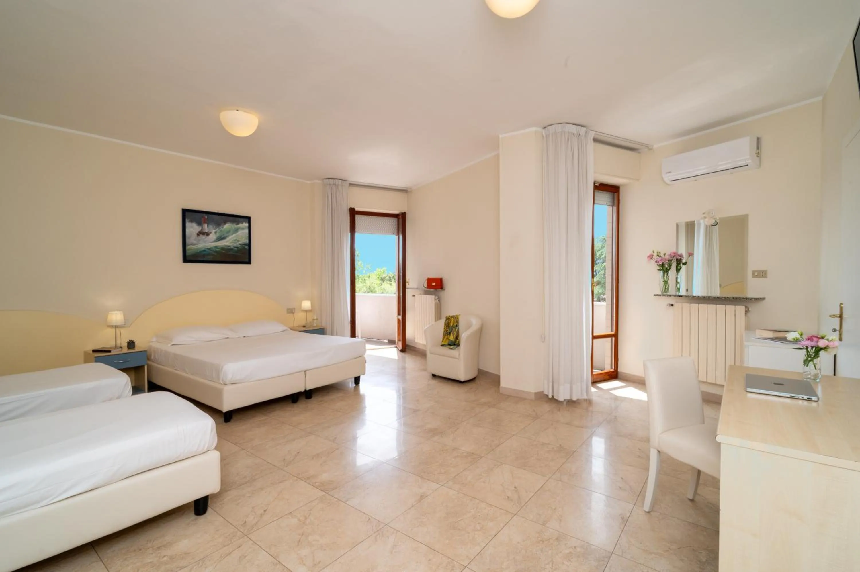 Bed in Hotel Riviera