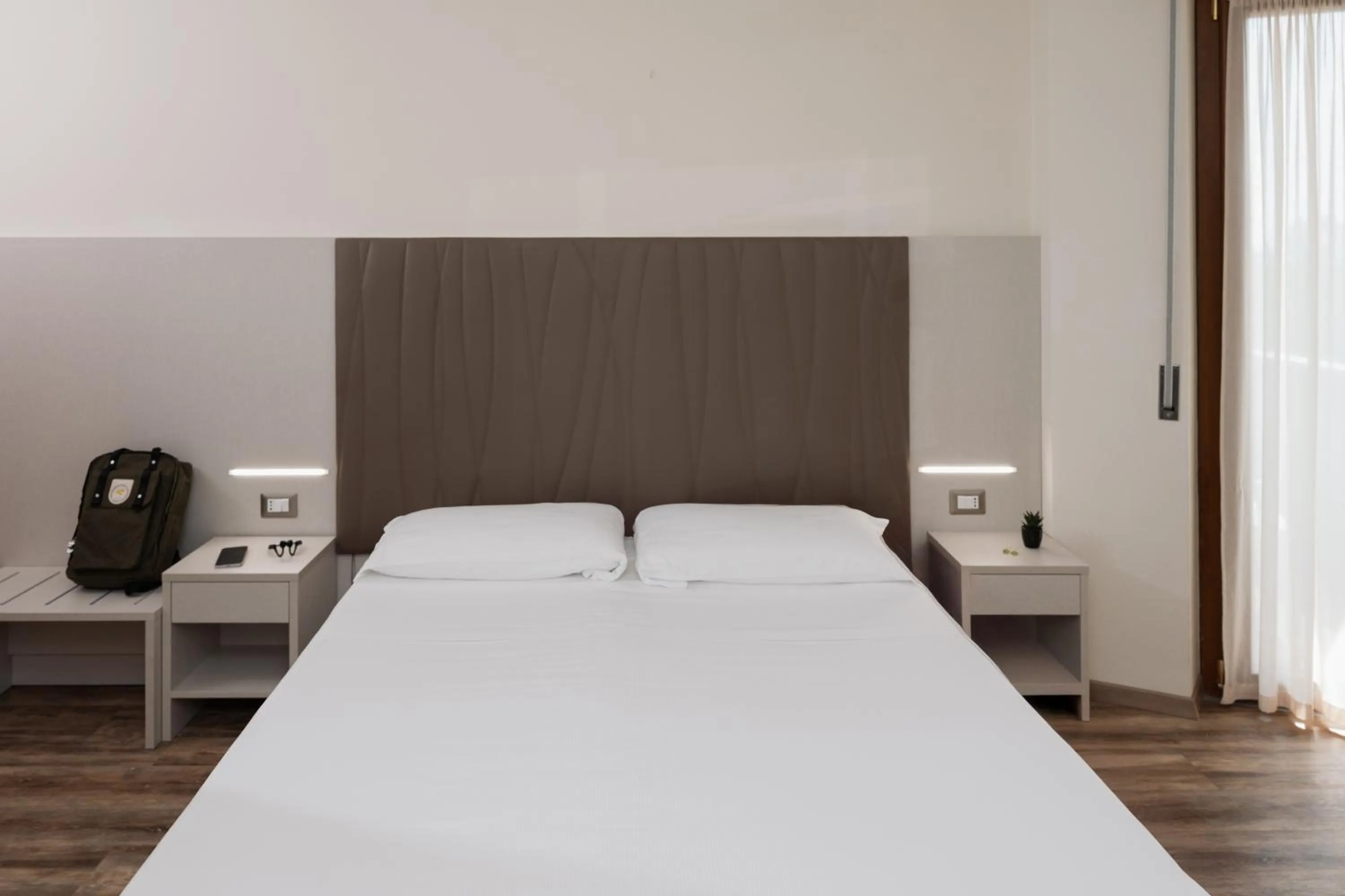 Bed in Hotel Riviera