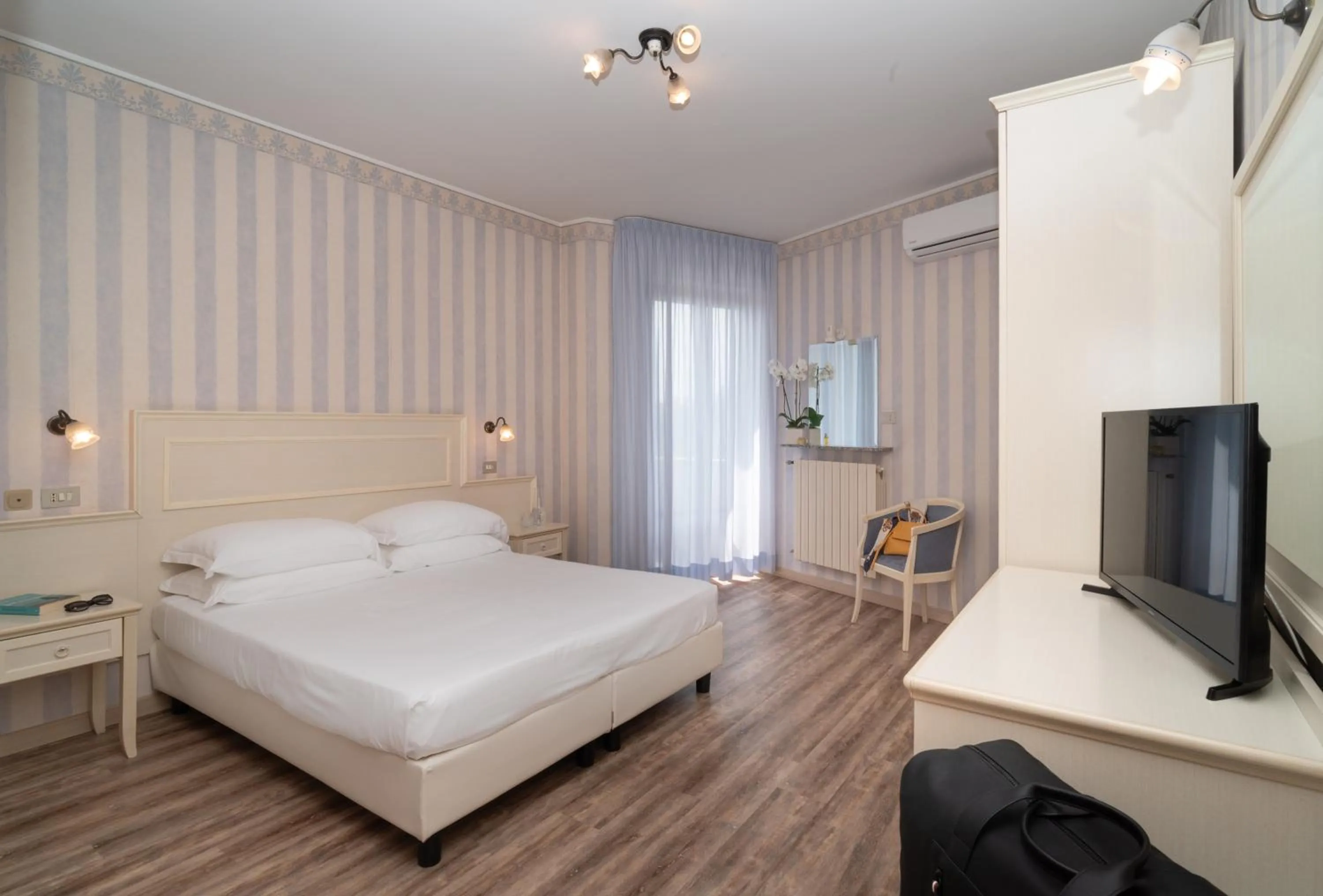 Bed in Hotel Riviera