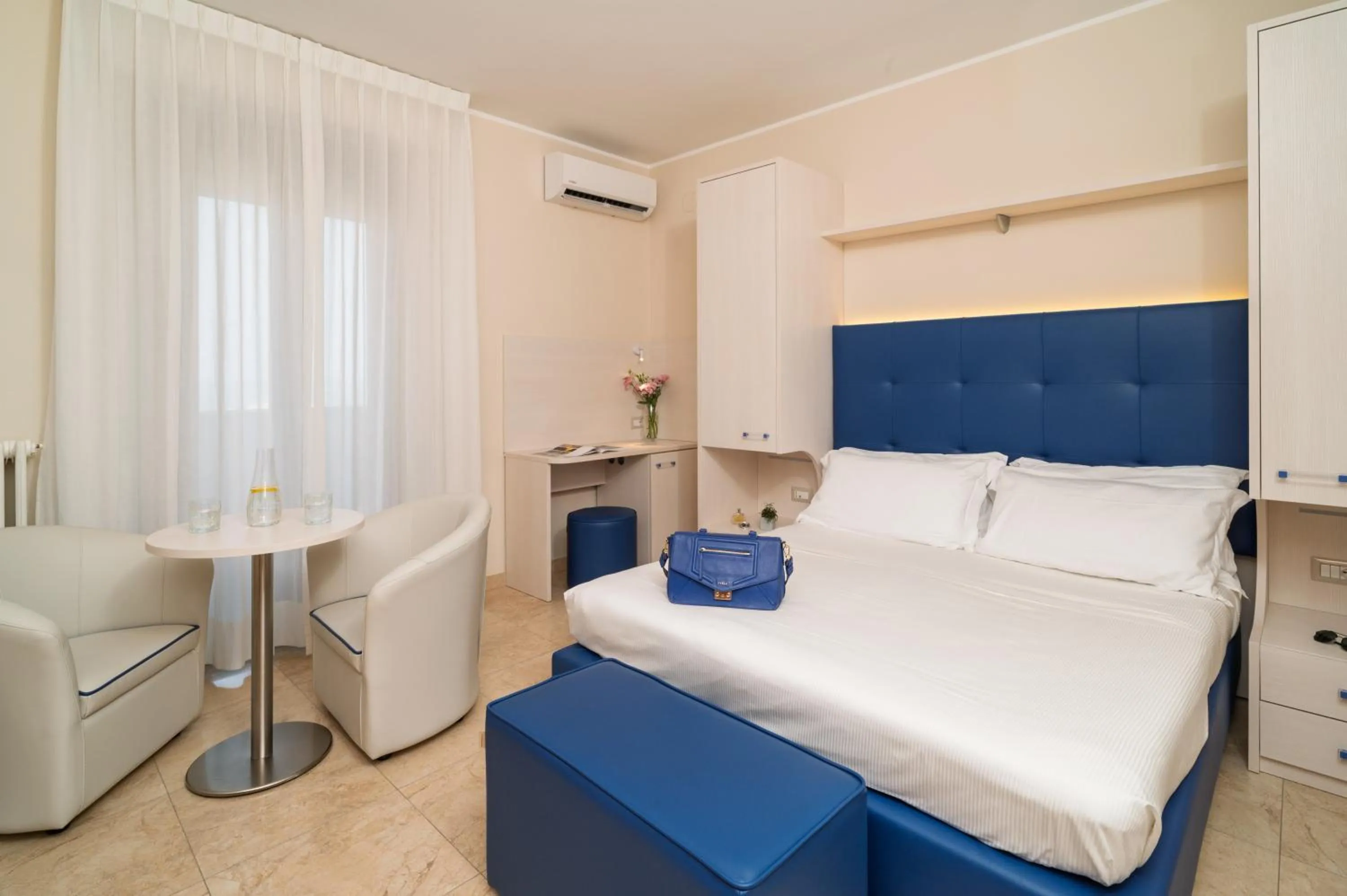 Bed in Hotel Riviera