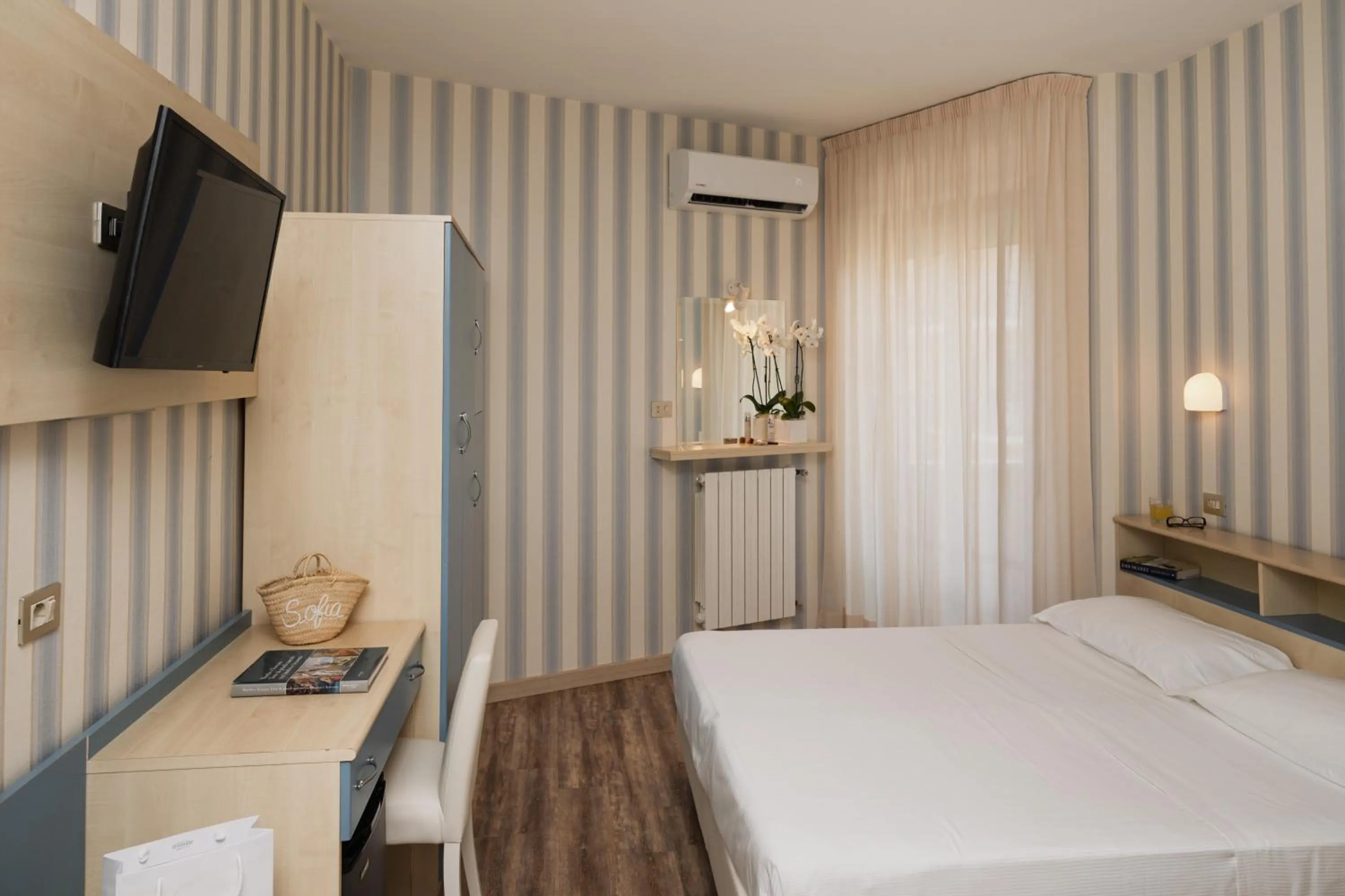 Bed in Hotel Riviera