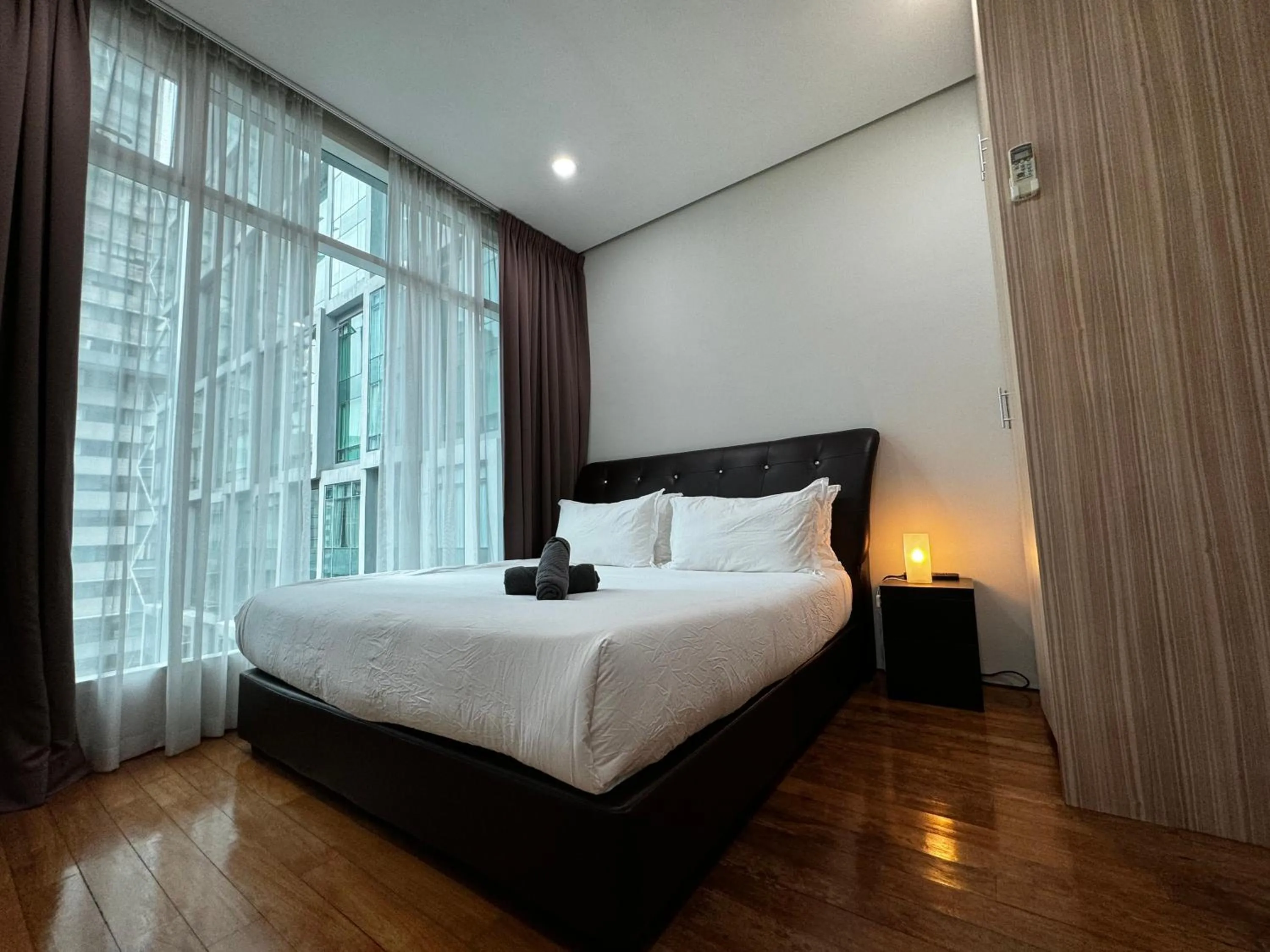 Bed in Soho Suites KLCC by Alucard's Cat