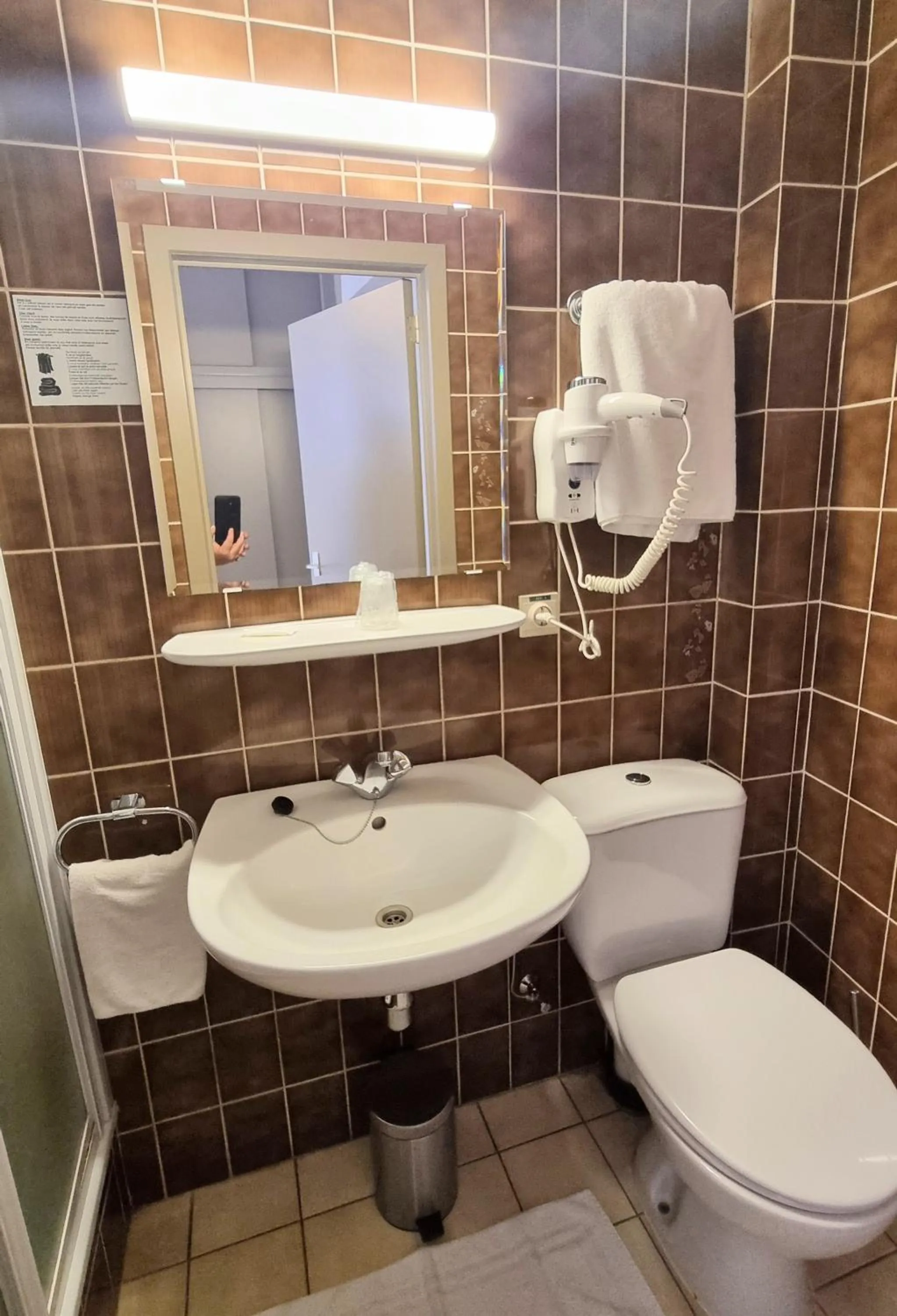 Toilet in Hotel De Golf