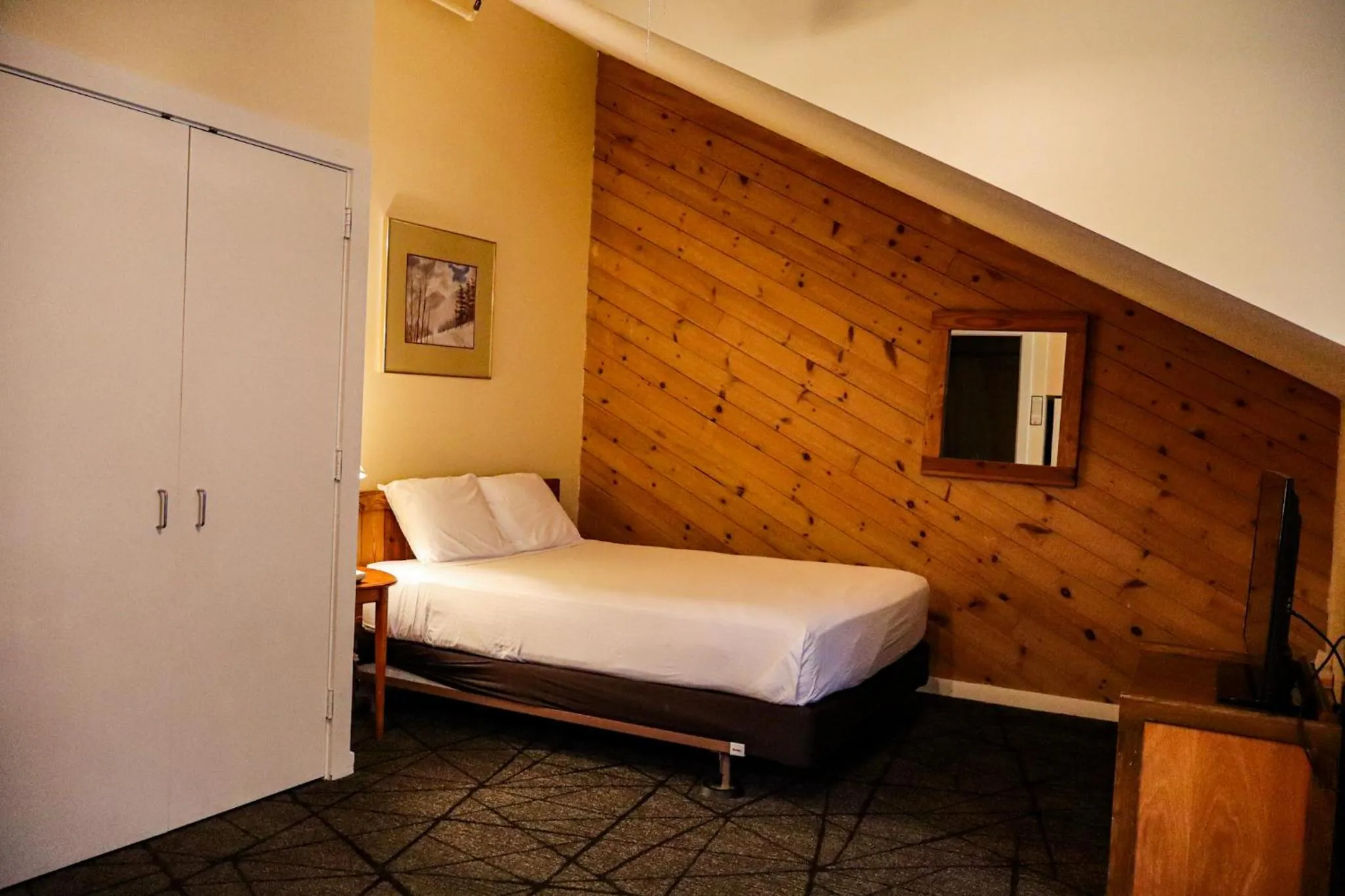 Bed in Snowy Owl Inn