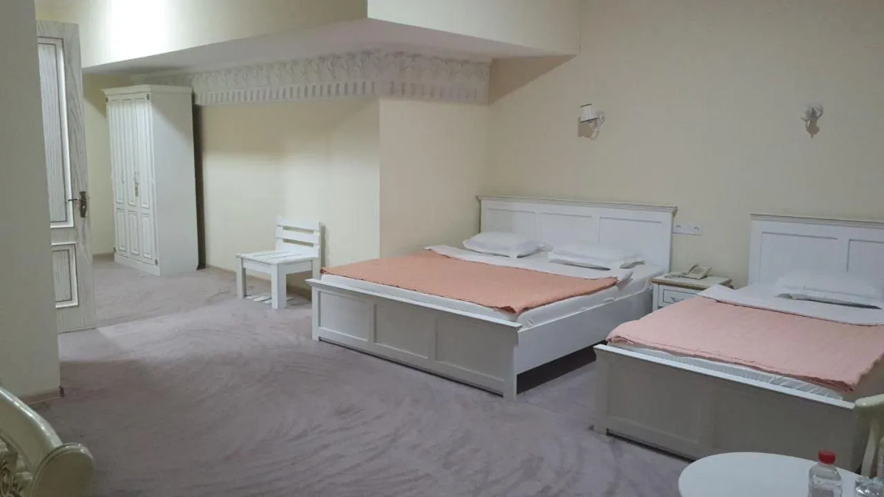 Bed in Hotel City Samarkand