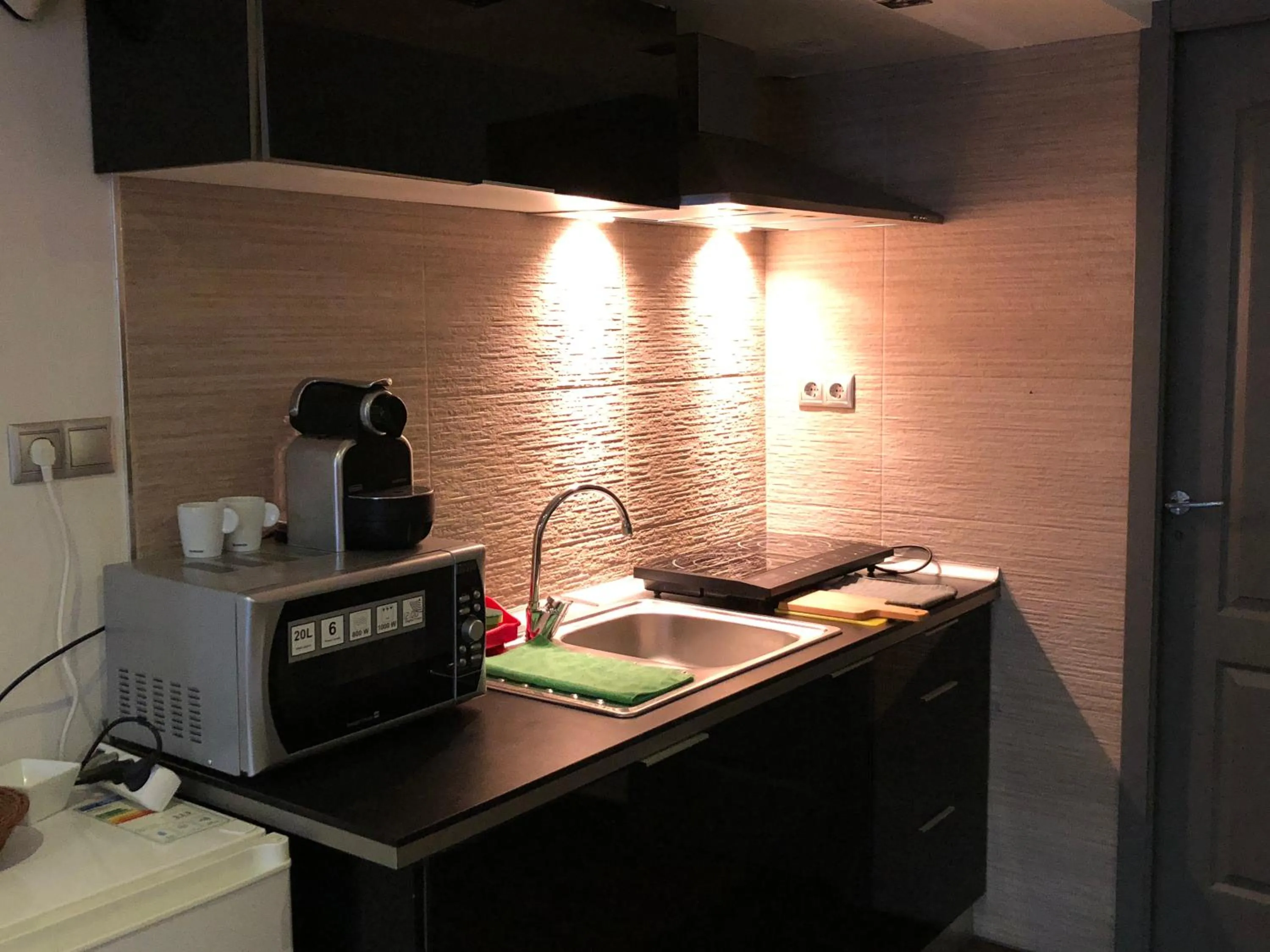 Kitchen or kitchenette in Concept Suites