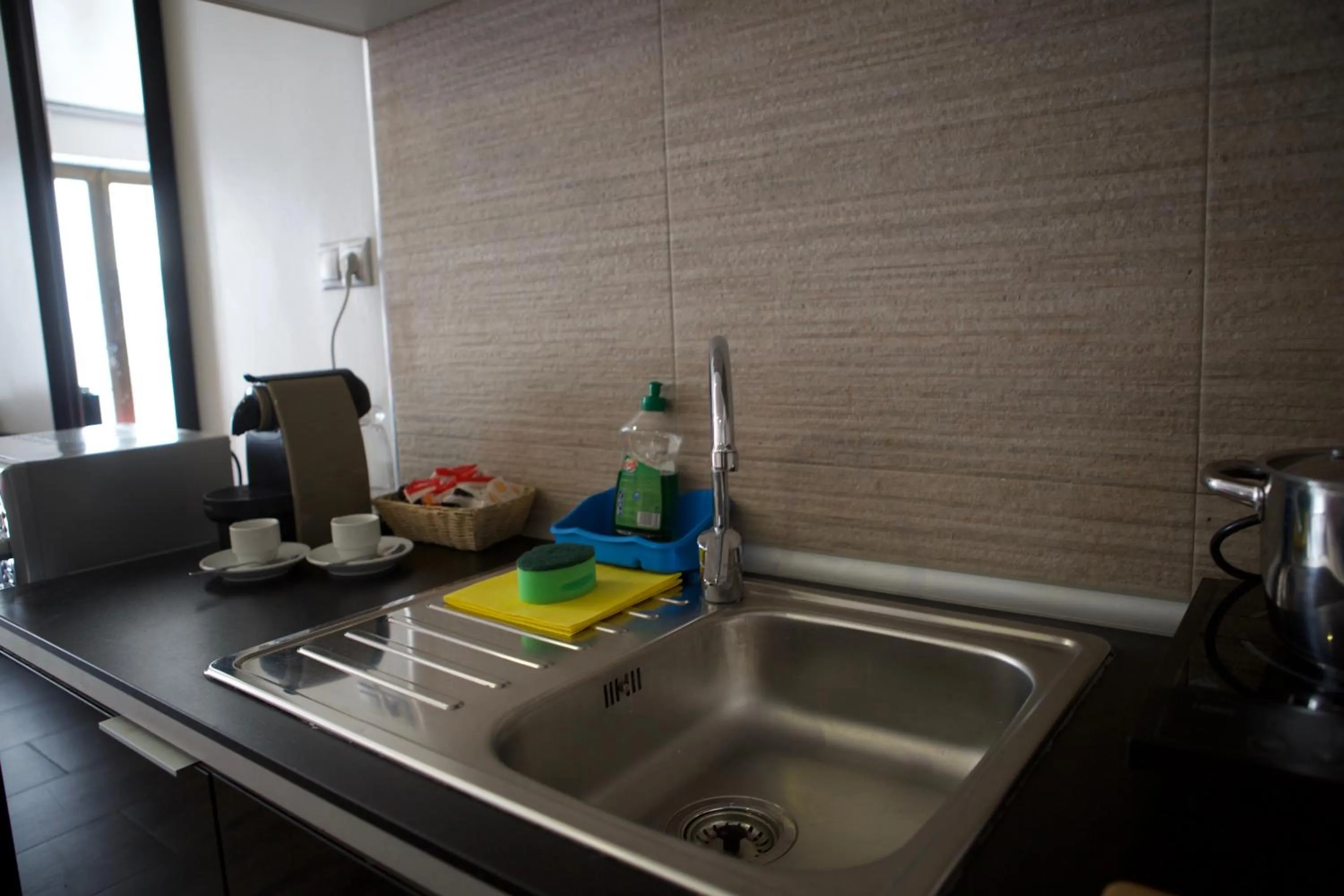 Kitchen or kitchenette in Concept Suites
