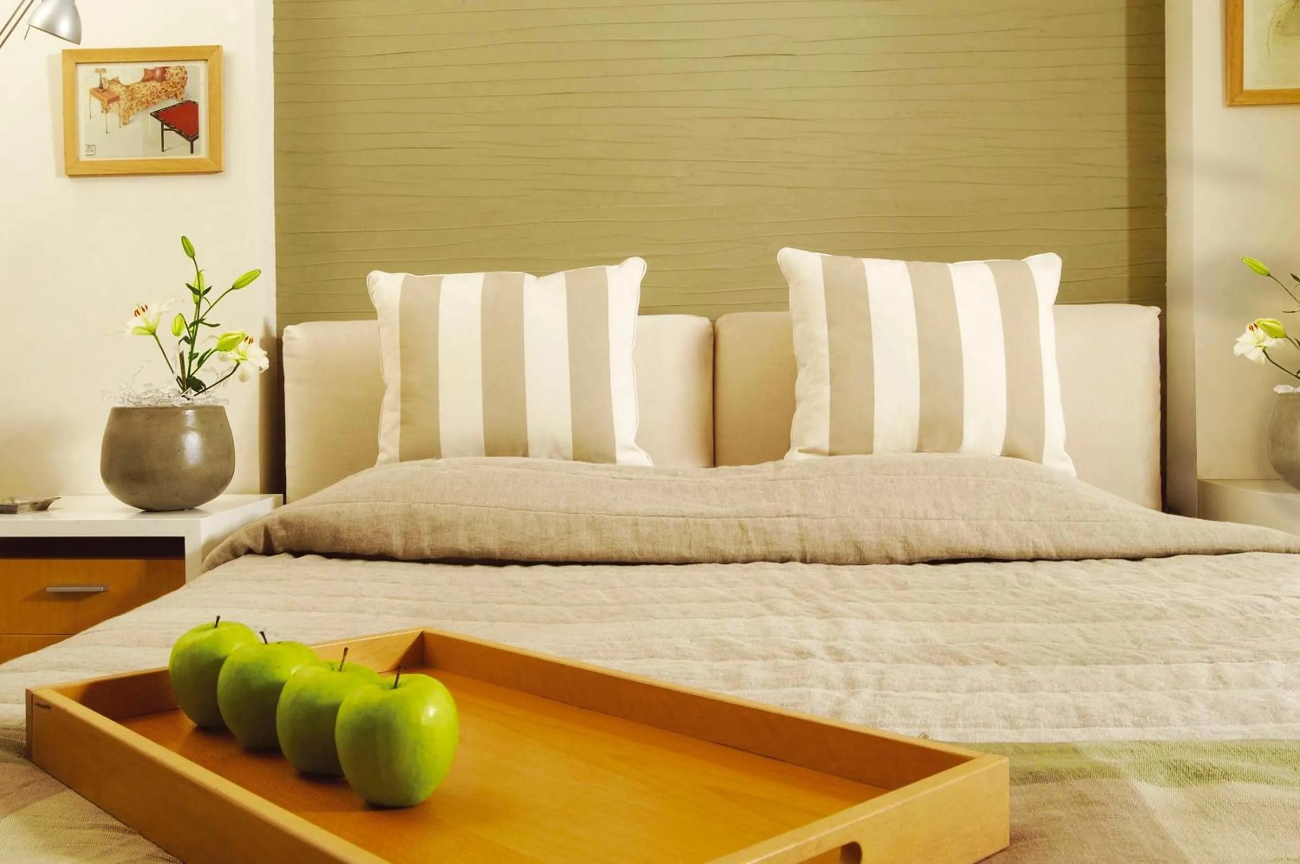 Bed in Pleiades Luxurious Villas