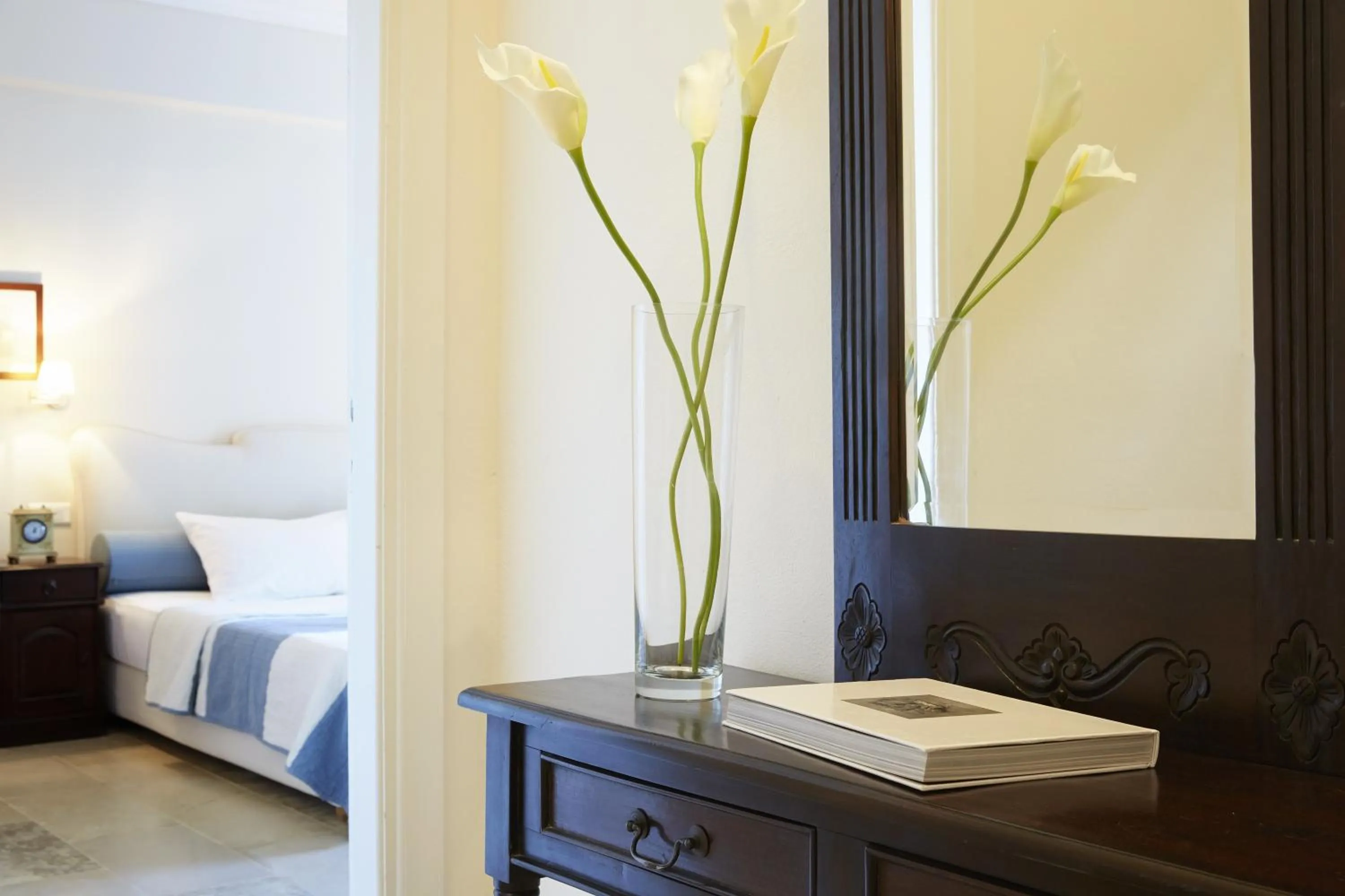 Bed in Pleiades Luxurious Villas