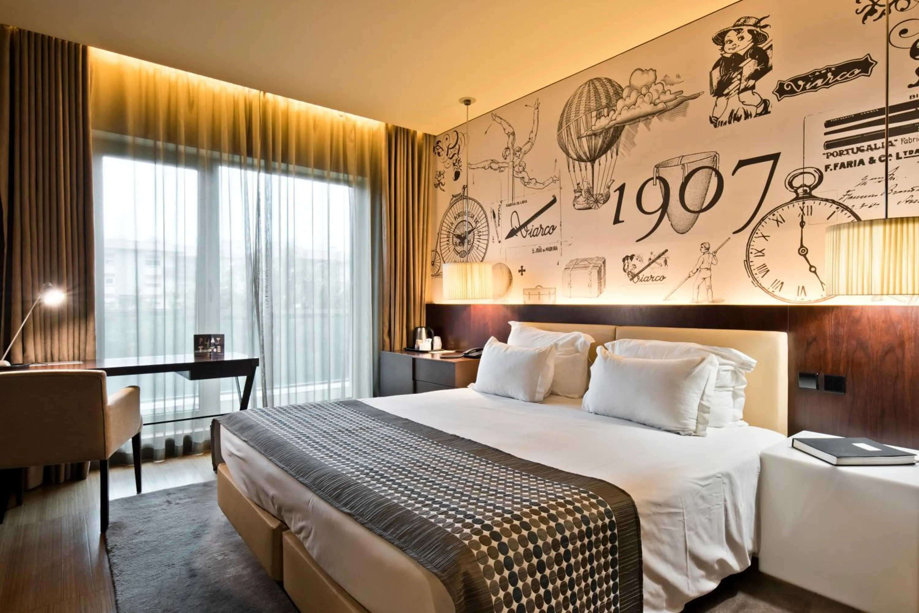 Bed in Golden Tulip São João da Madeira Hotel