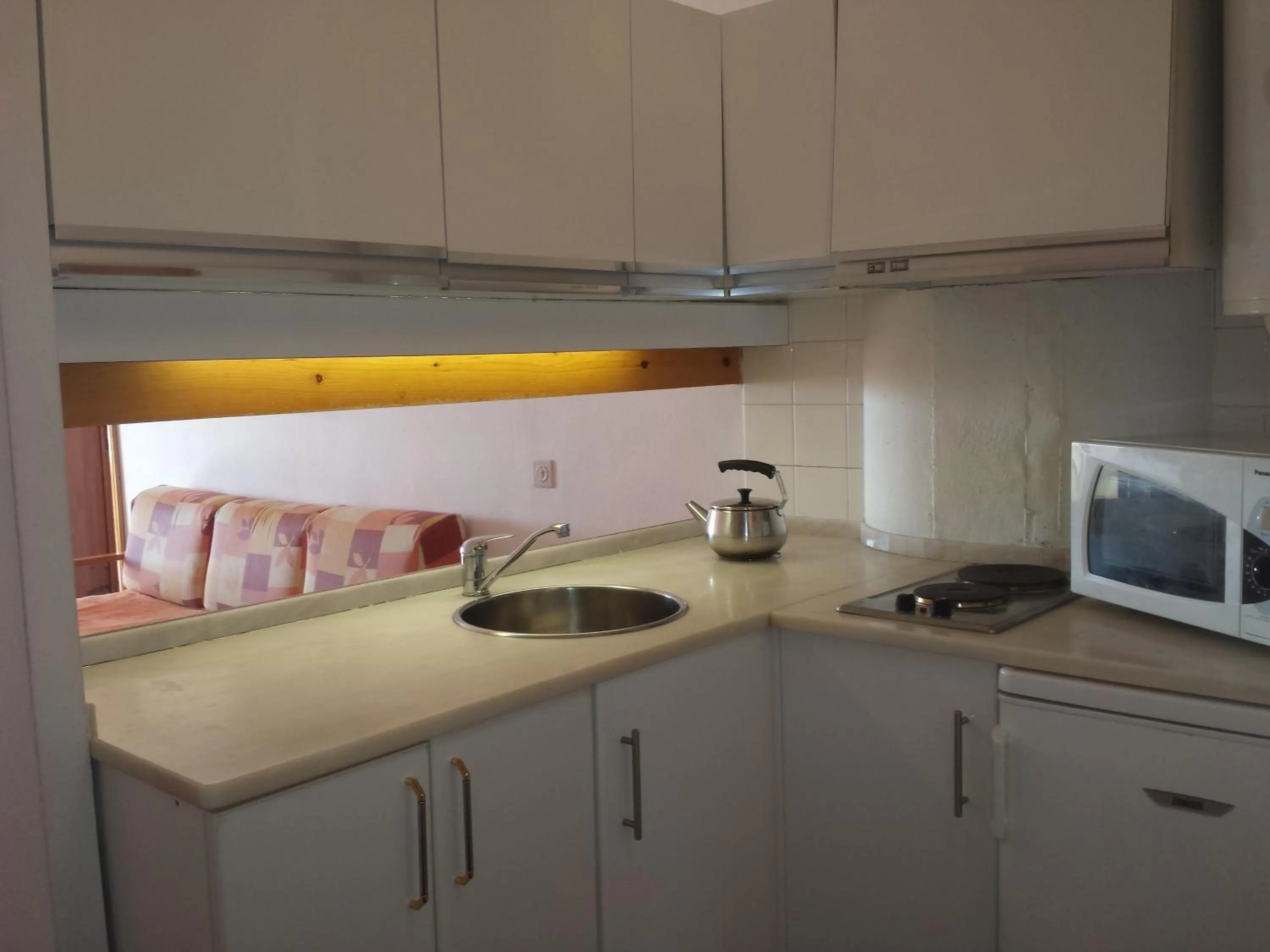 Kitchen or kitchenette in Apartamentos Guadiana