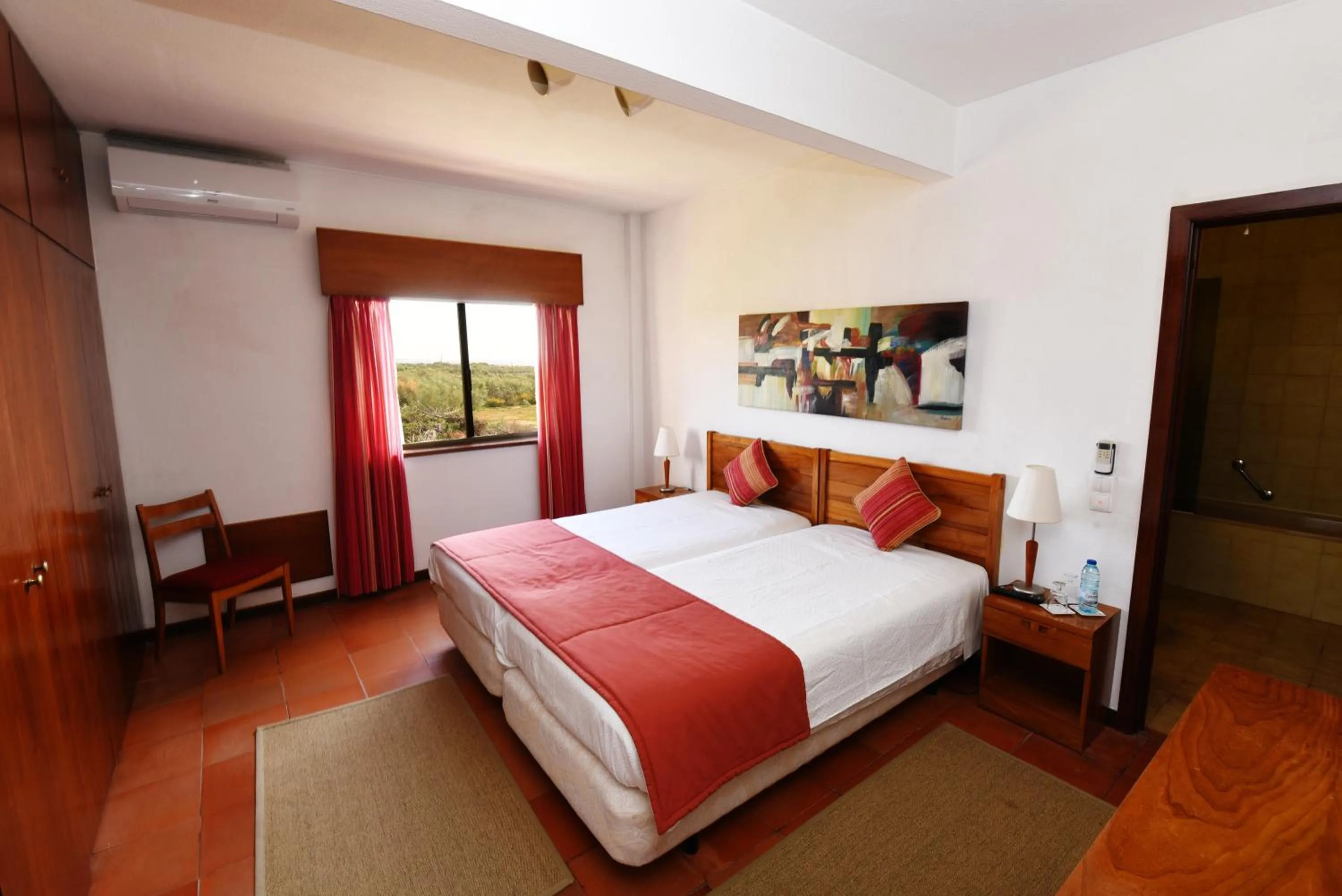 Bedroom, Bed in Praia da Lota Beachfront Resort - Hotel & Apartments