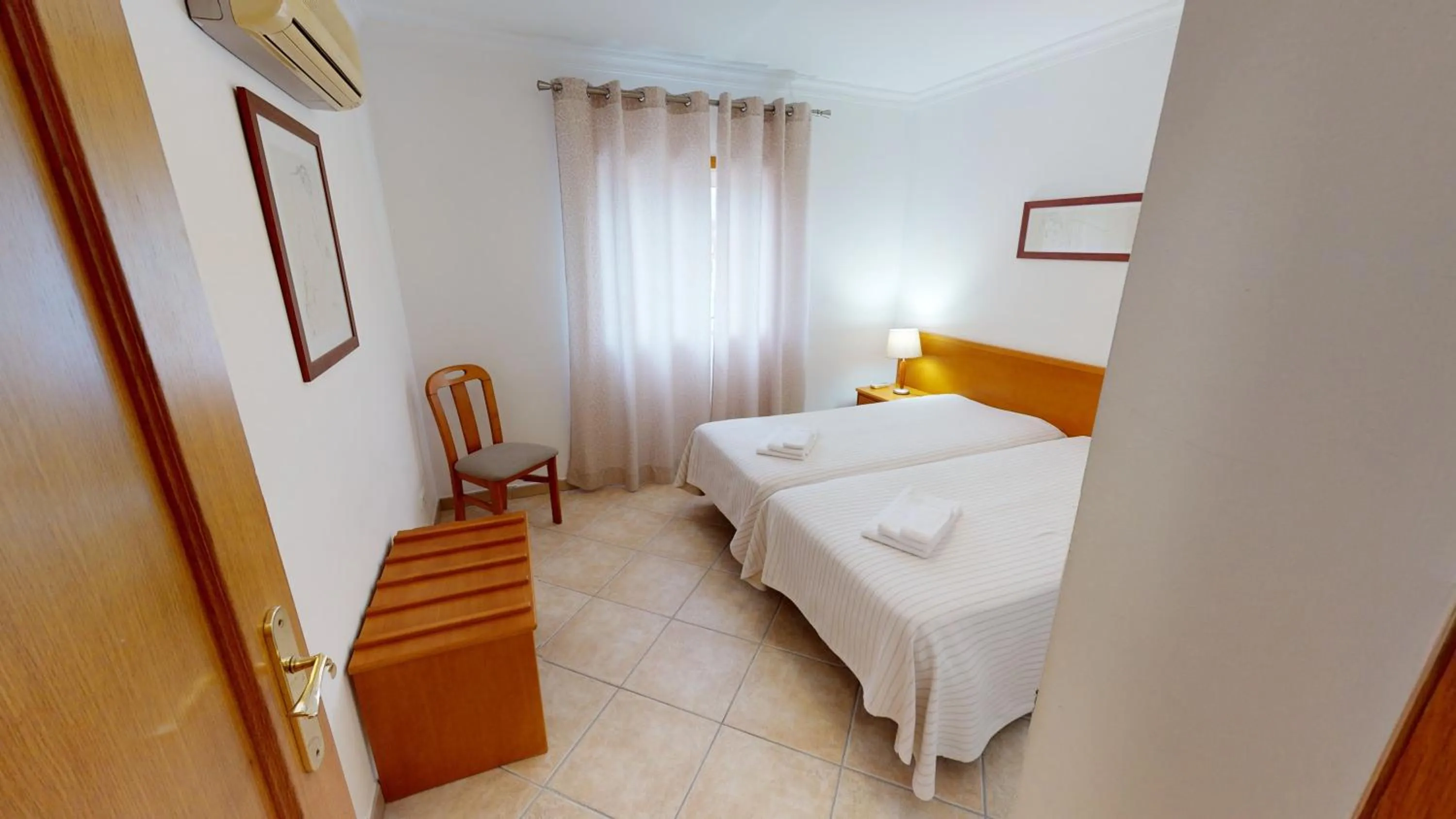 Bedroom, Bed in Praia da Lota Beachfront Resort - Hotel & Apartments