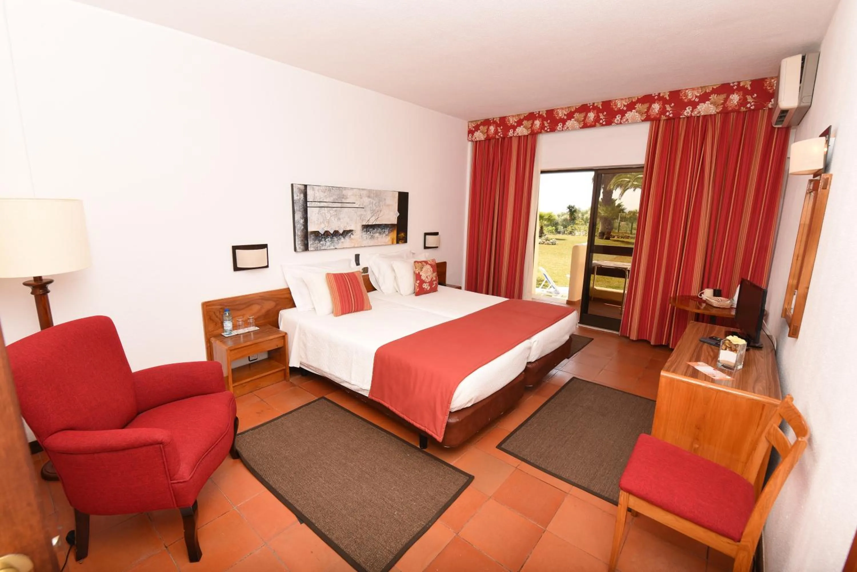 Bed in Praia da Lota Beachfront Resort - Hotel & Apartments