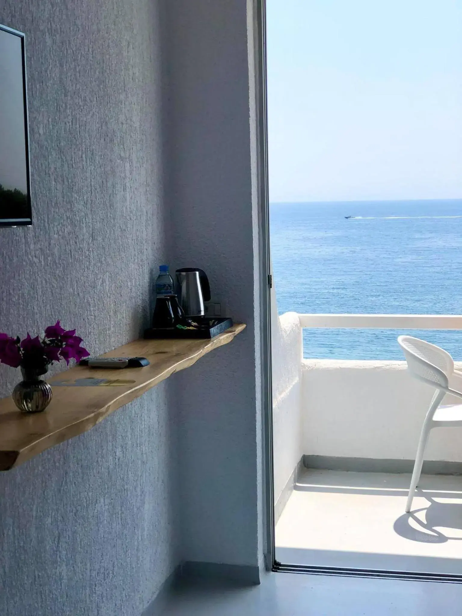 Deluxe Double Room with Balcony and Sea View in Geo & Art Boutique Hotel Himara Deluxe Double Room with Balcony and Sea View in Geo & Art Boutique Hotel Himara