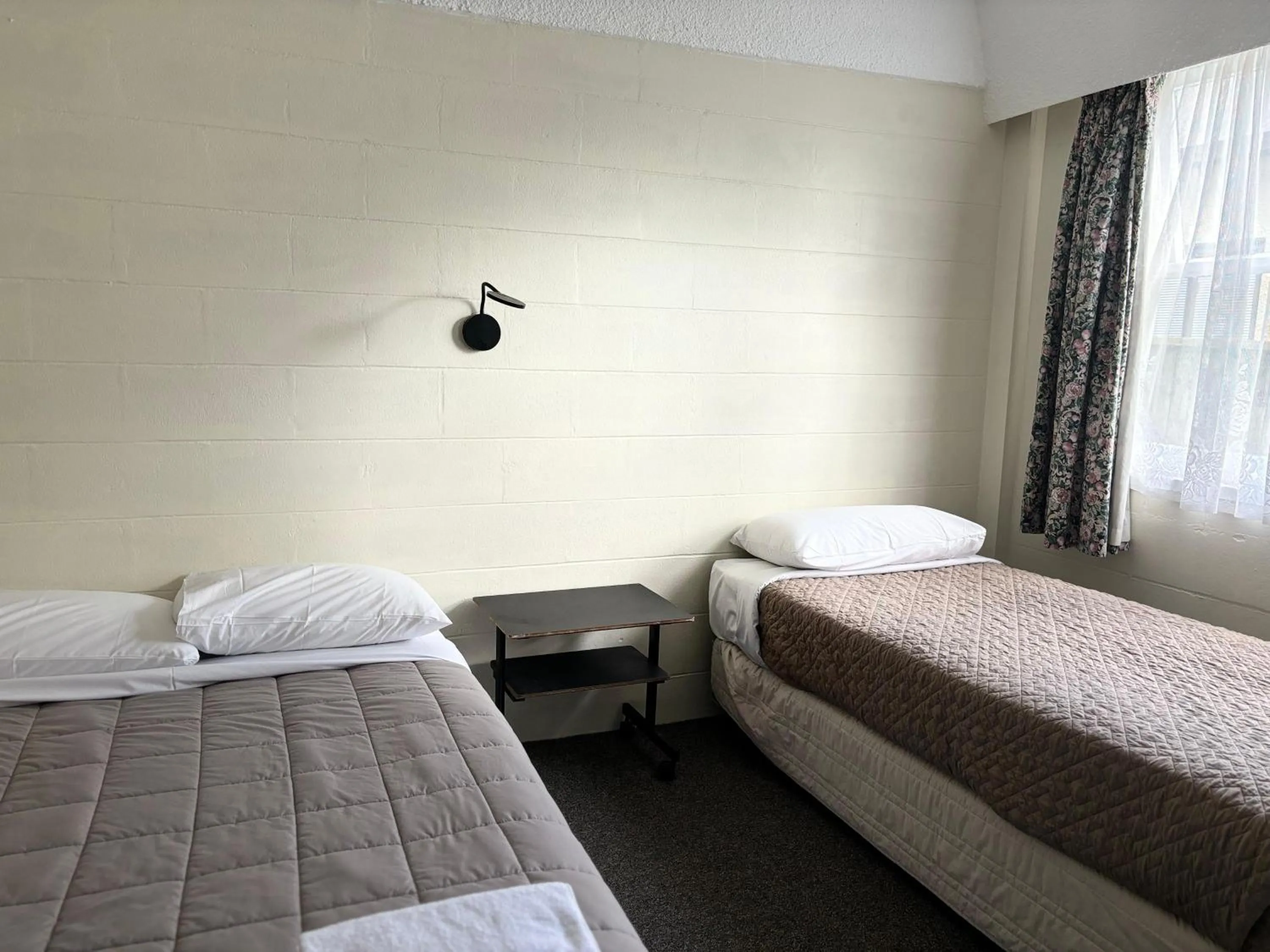 Bed in Manhattan Motel