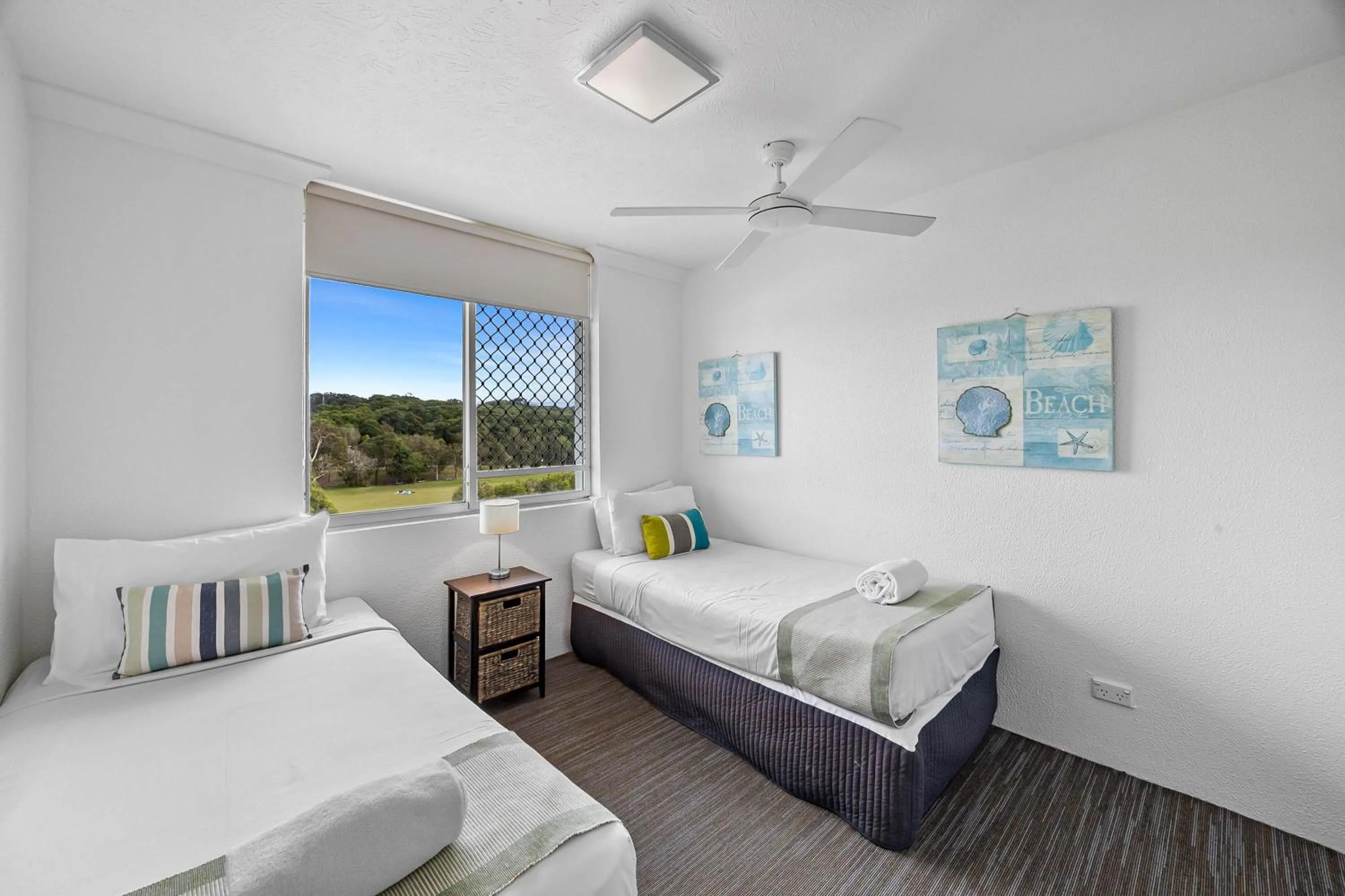 Bed in Mandolin Beachfront Resort