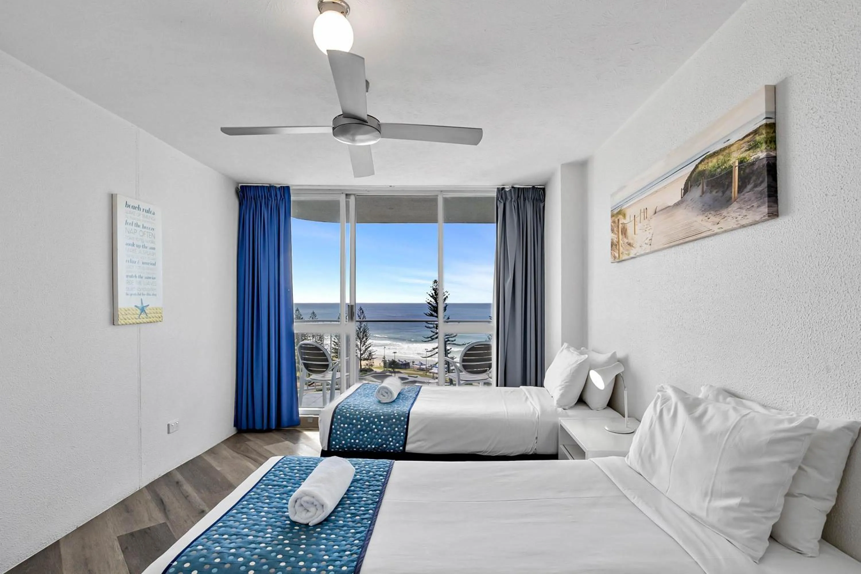 Bed in Mandolin Beachfront Resort