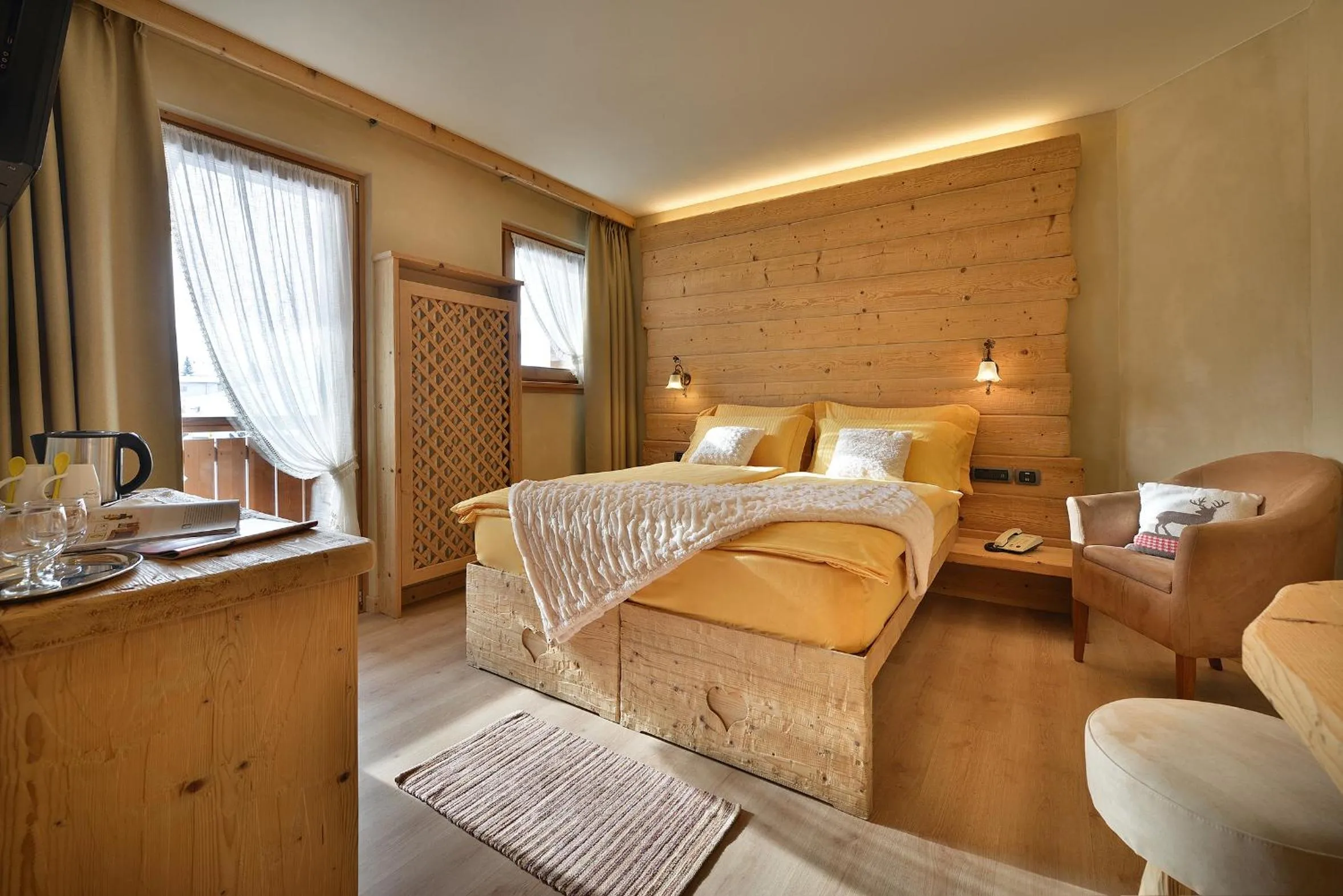 Bed in Hotel Costanza Mountain Holiday