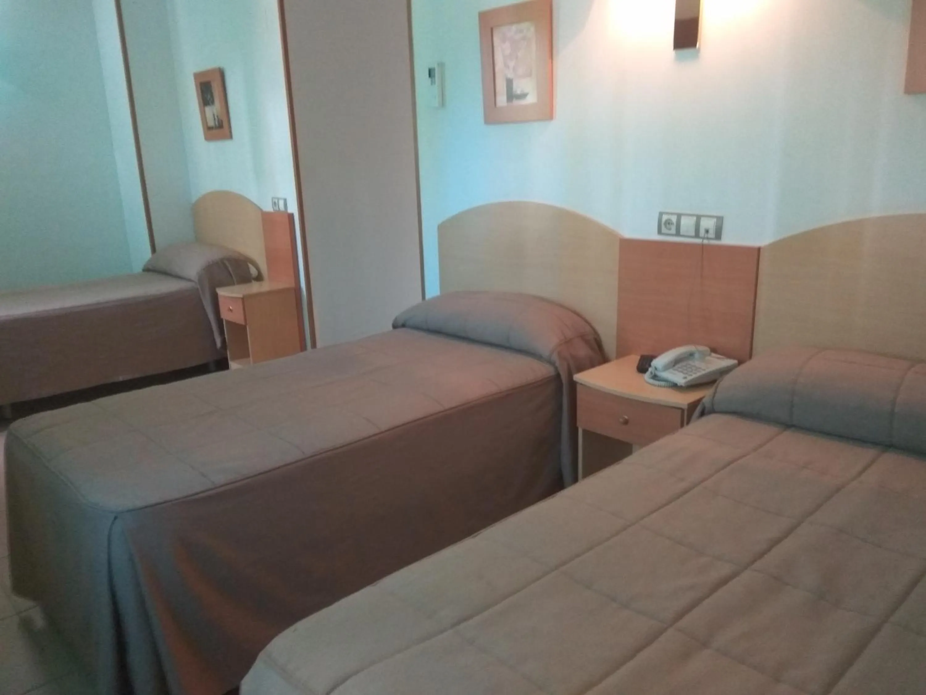 Bed in Hostal El Arco