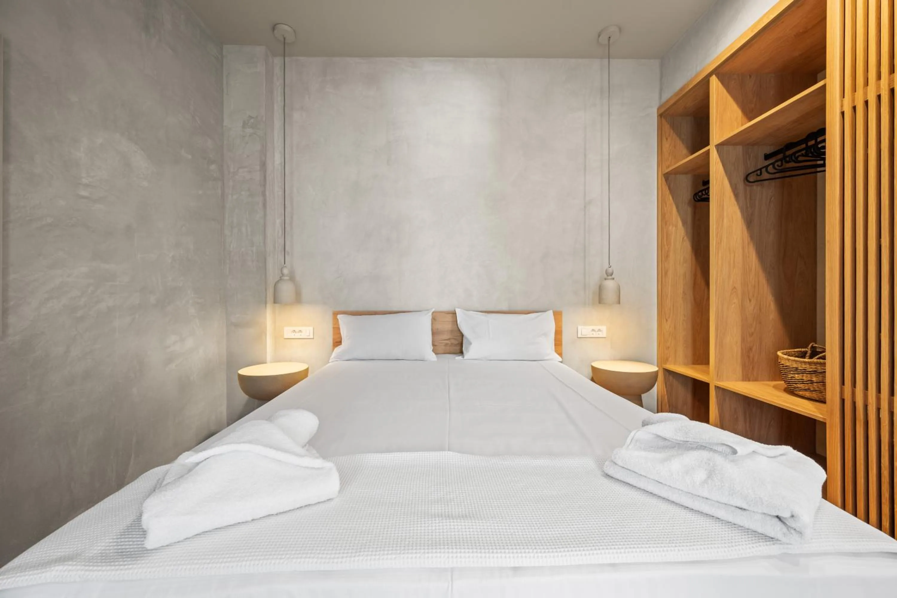 Bed in Nikos Apartments