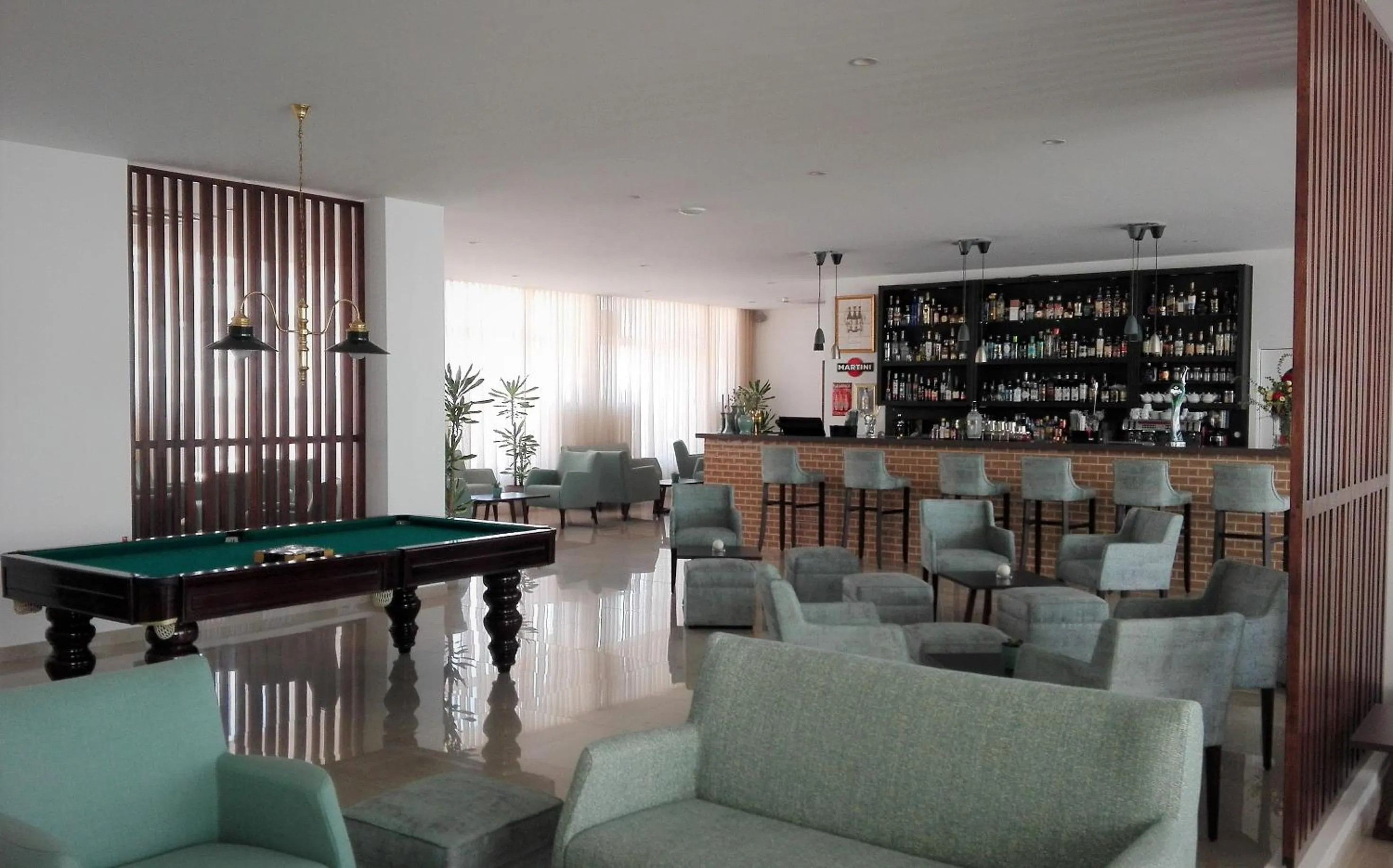 Communal lounge/ TV room in Hotel Melius