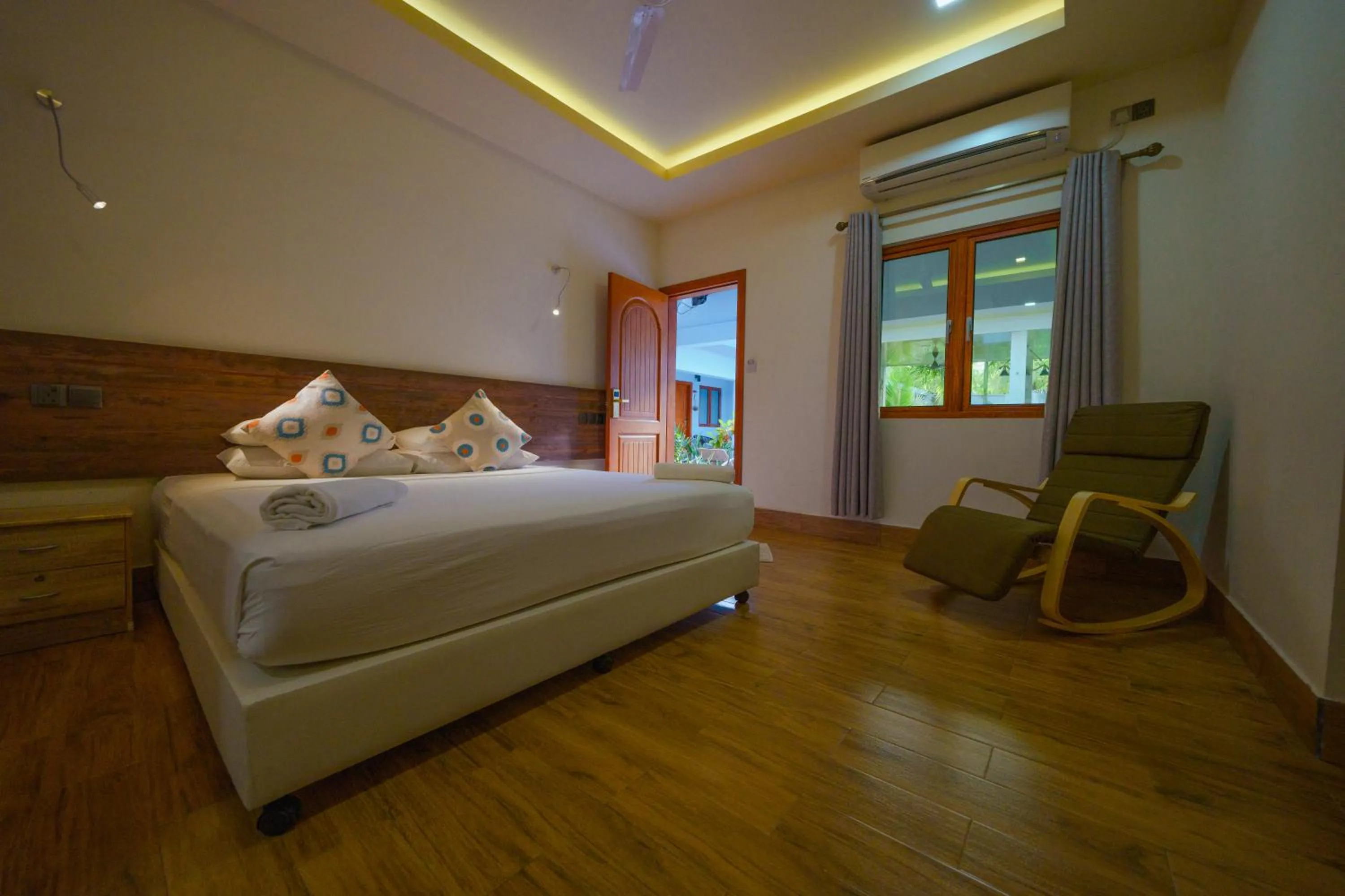 Bed in Tiger Shark Residence & Dive