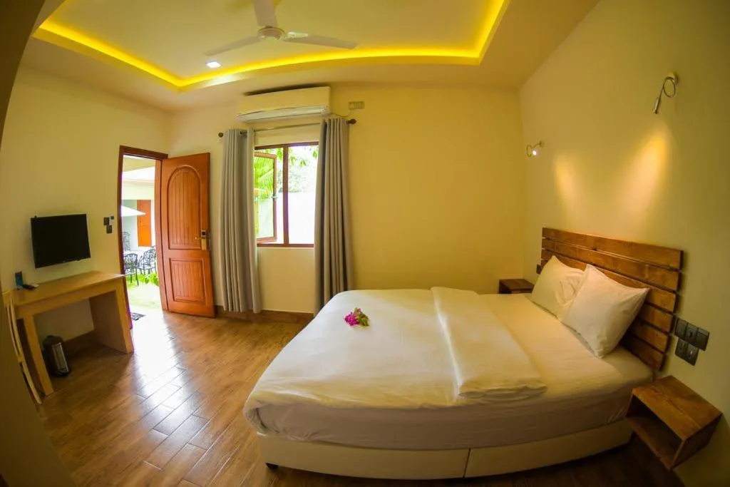 Bed in Tiger Shark Residence & Dive