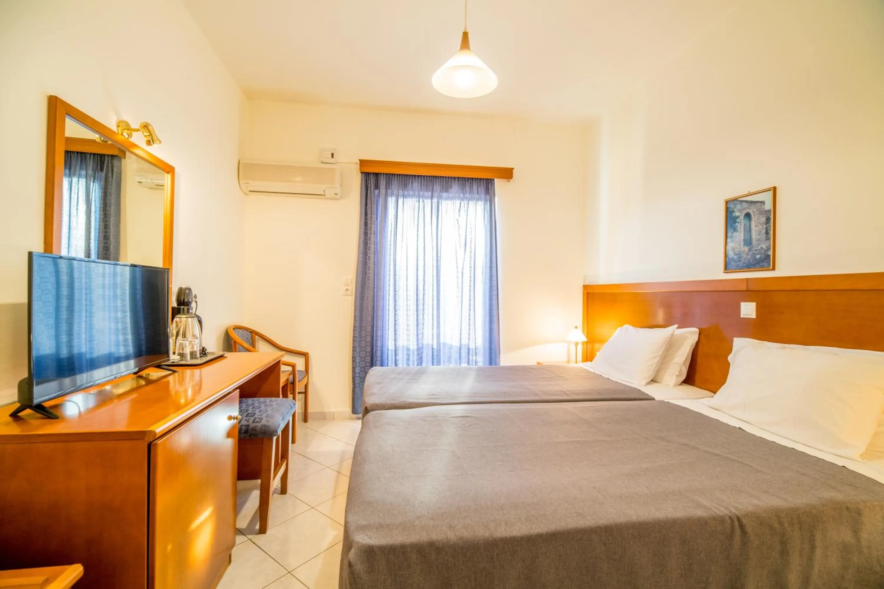 Bed in Hiona Holiday Hotel