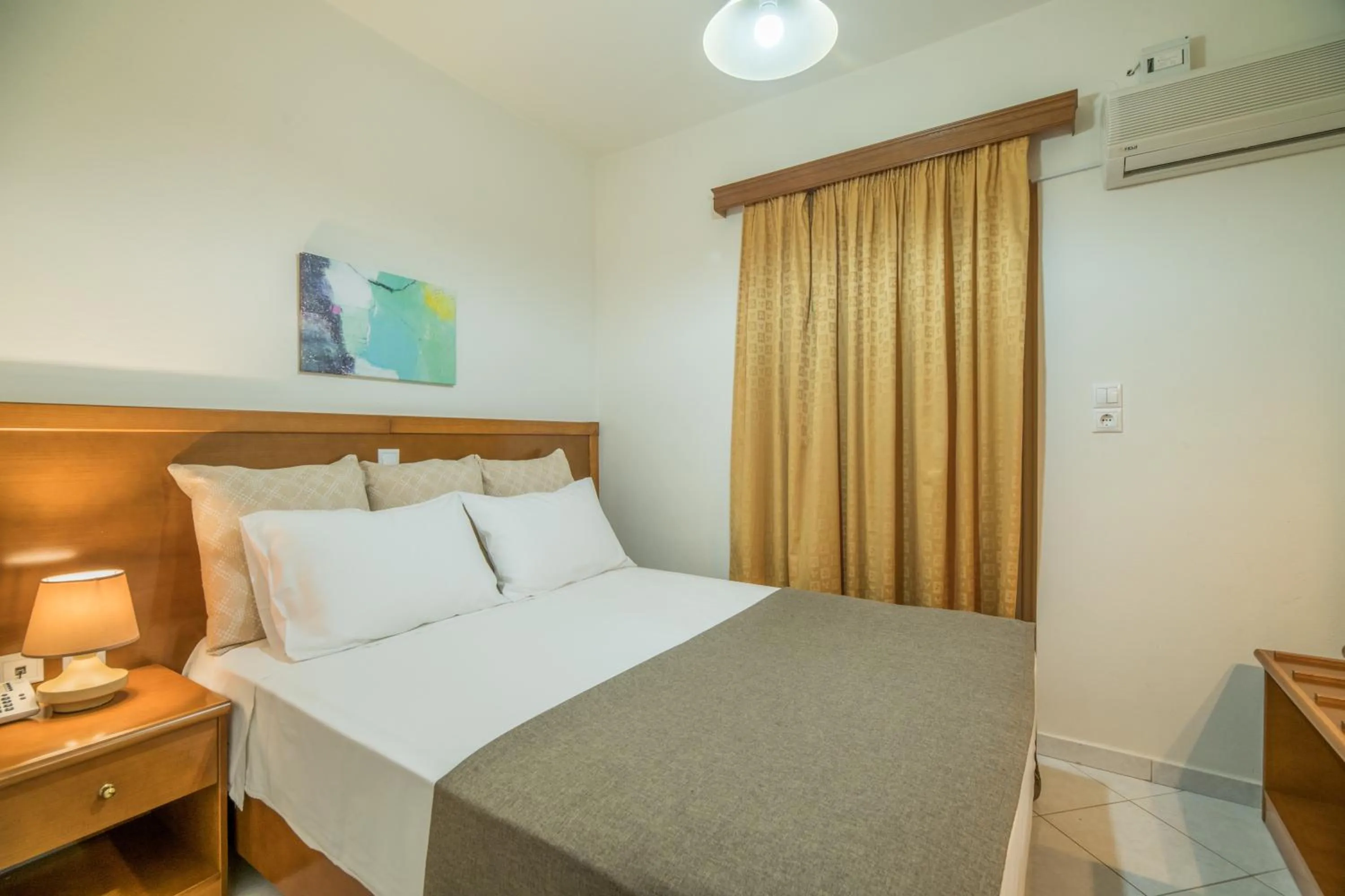 Bed in Hiona Holiday Hotel