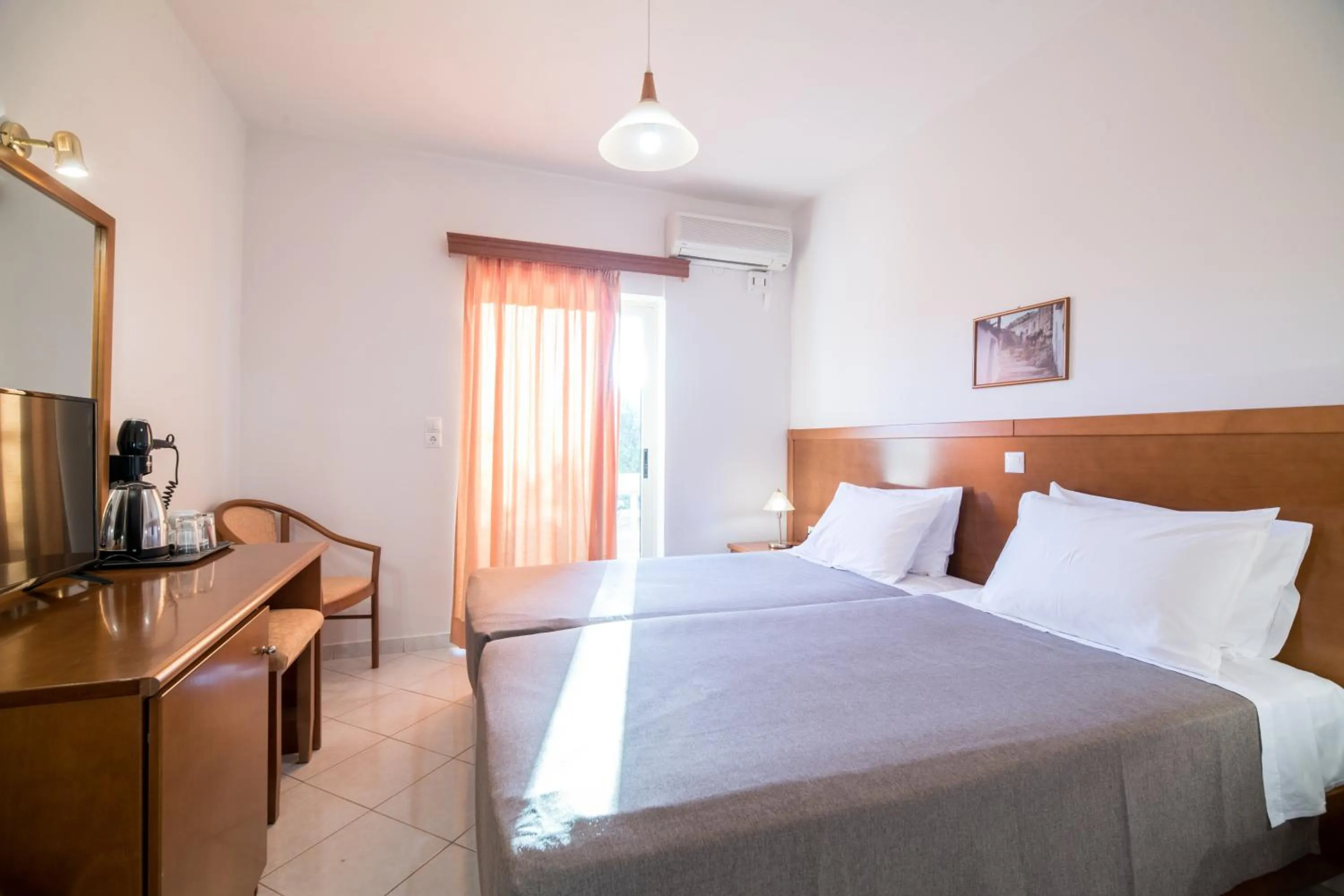 Bed in Hiona Holiday Hotel