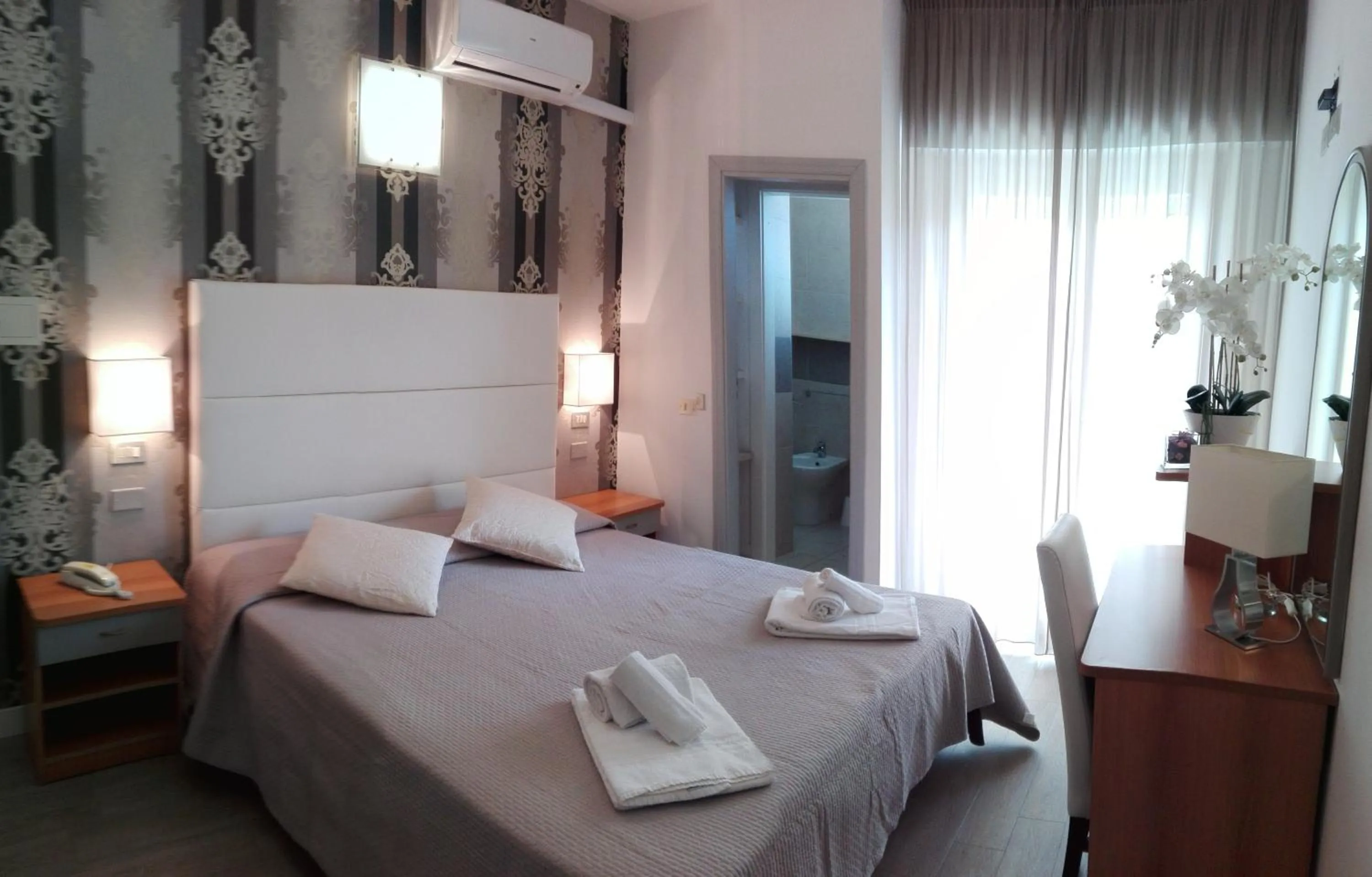 Bedroom in Hotel Ermeti B&B Brunch