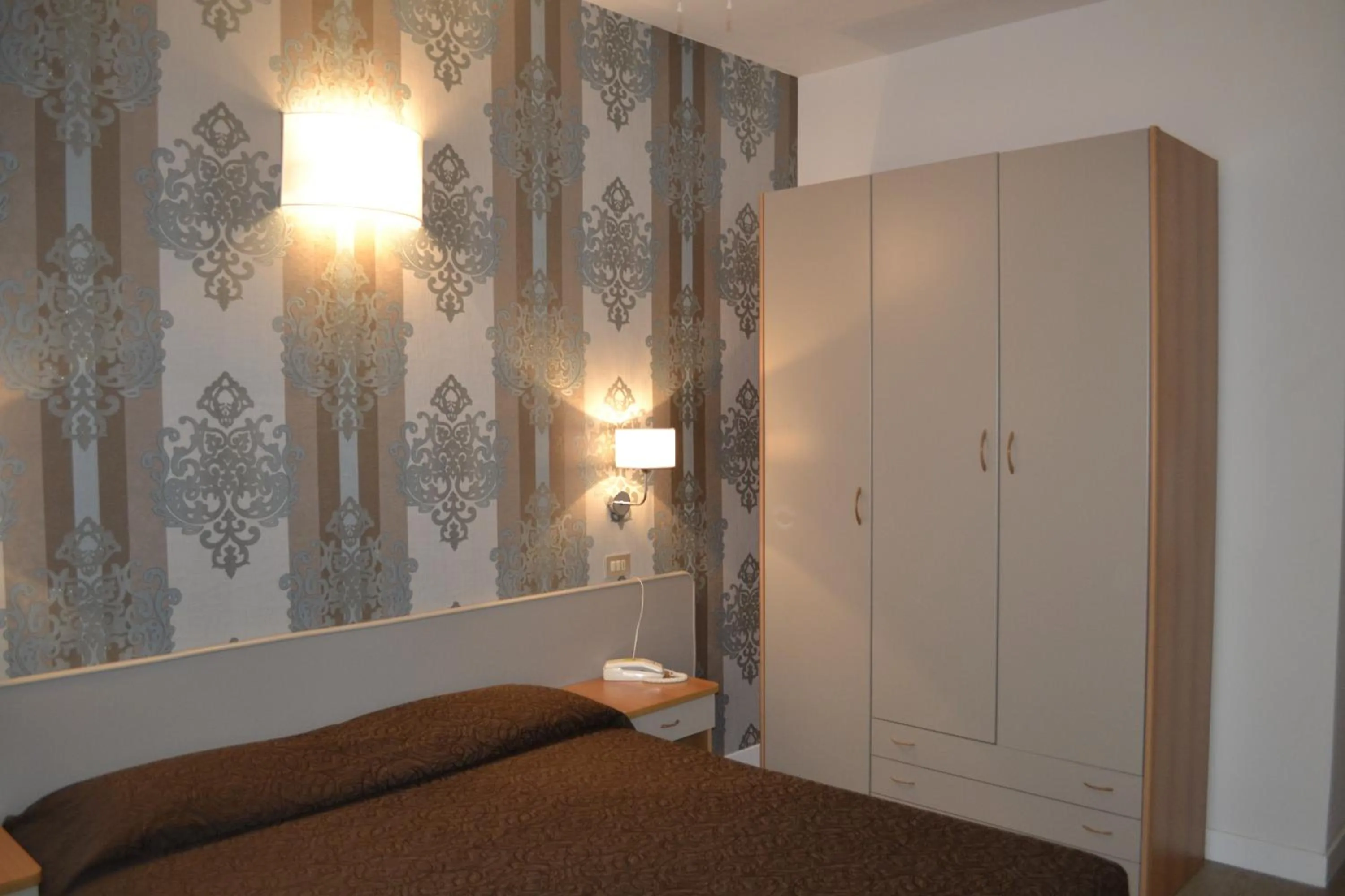 Bedroom in Hotel Ermeti B&B Brunch