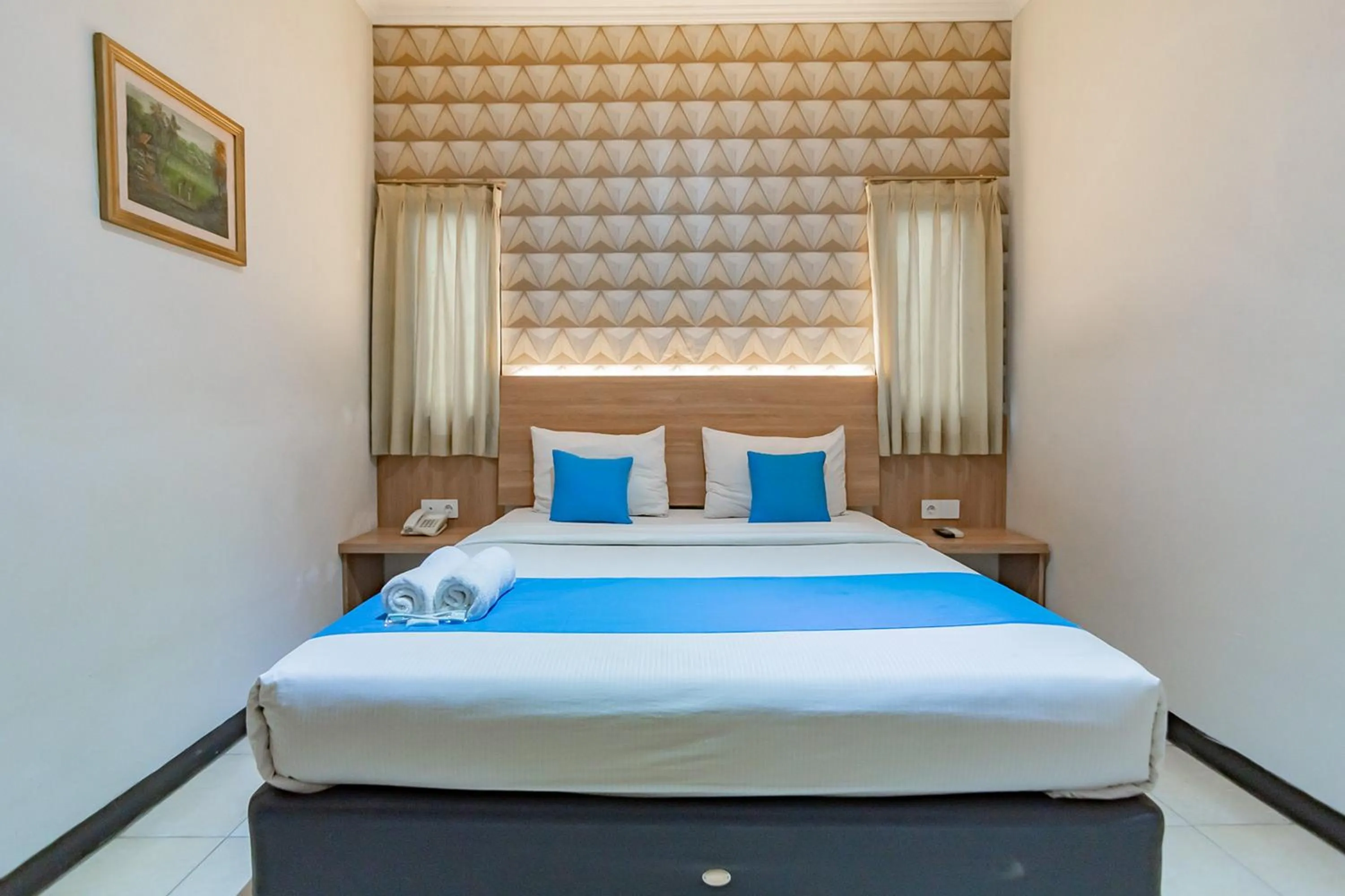 Bed in Cihampelas Hotel 2 Mitra RedDoorz