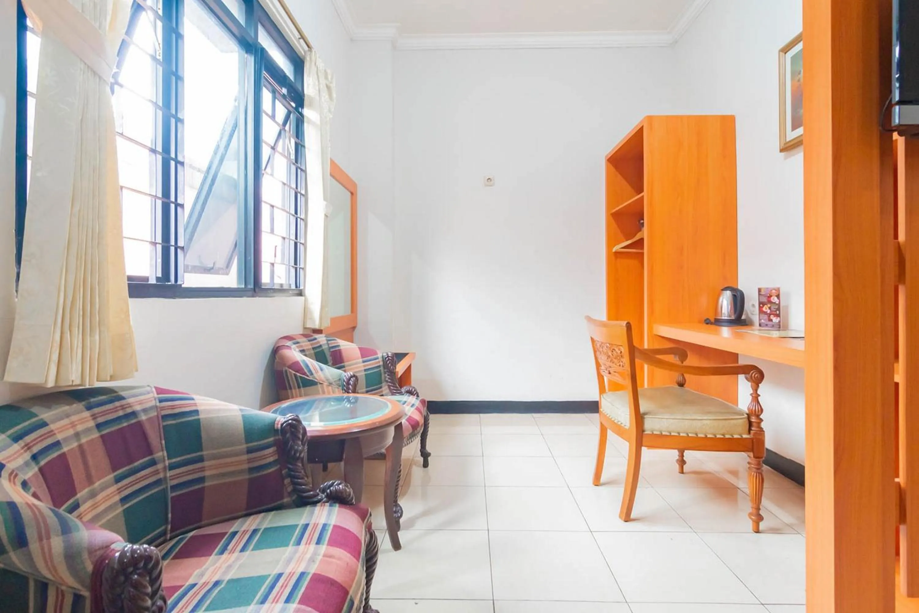 Living room in Cihampelas Hotel 2 Mitra RedDoorz