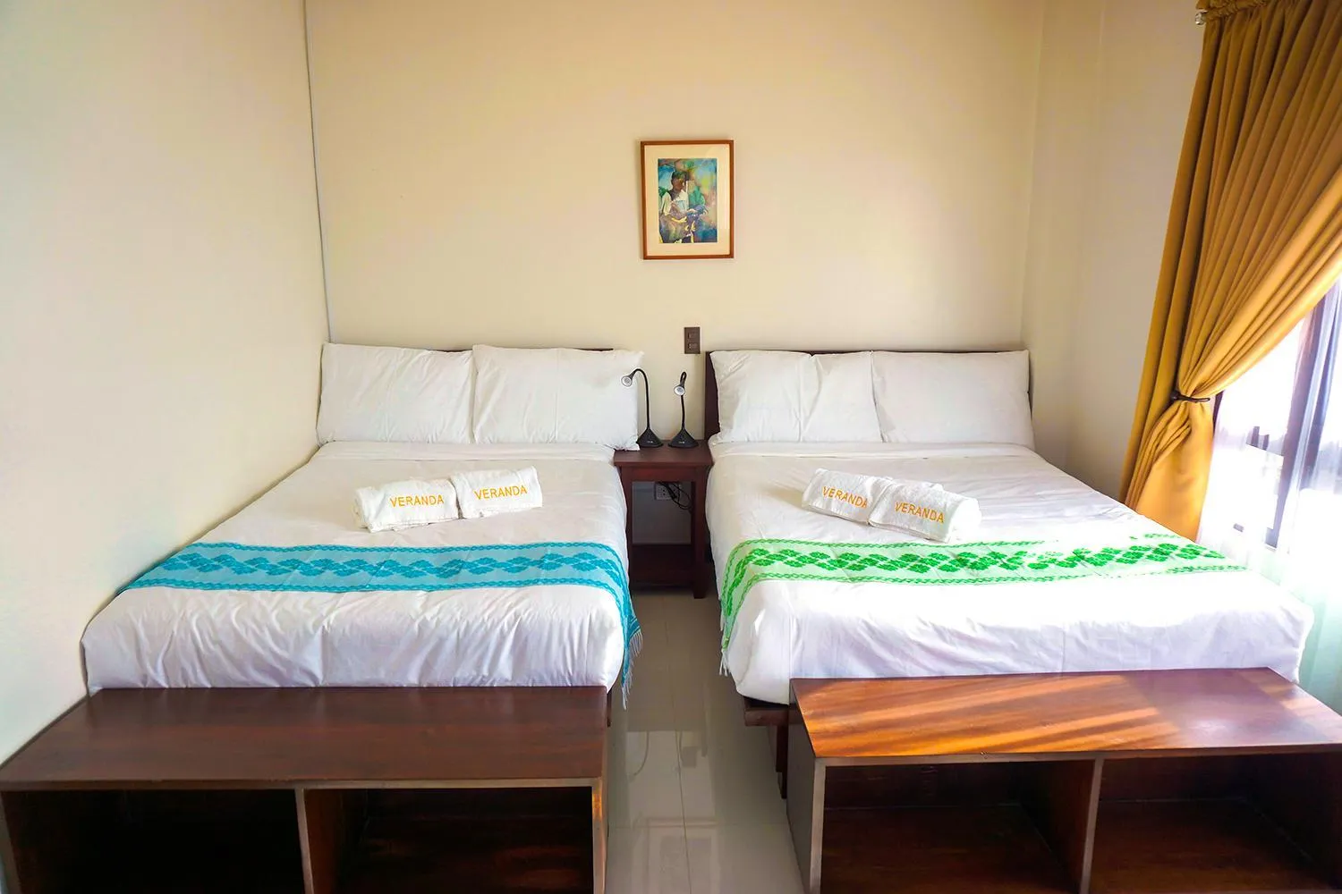 Bed in Veranda Suites and Restaurant