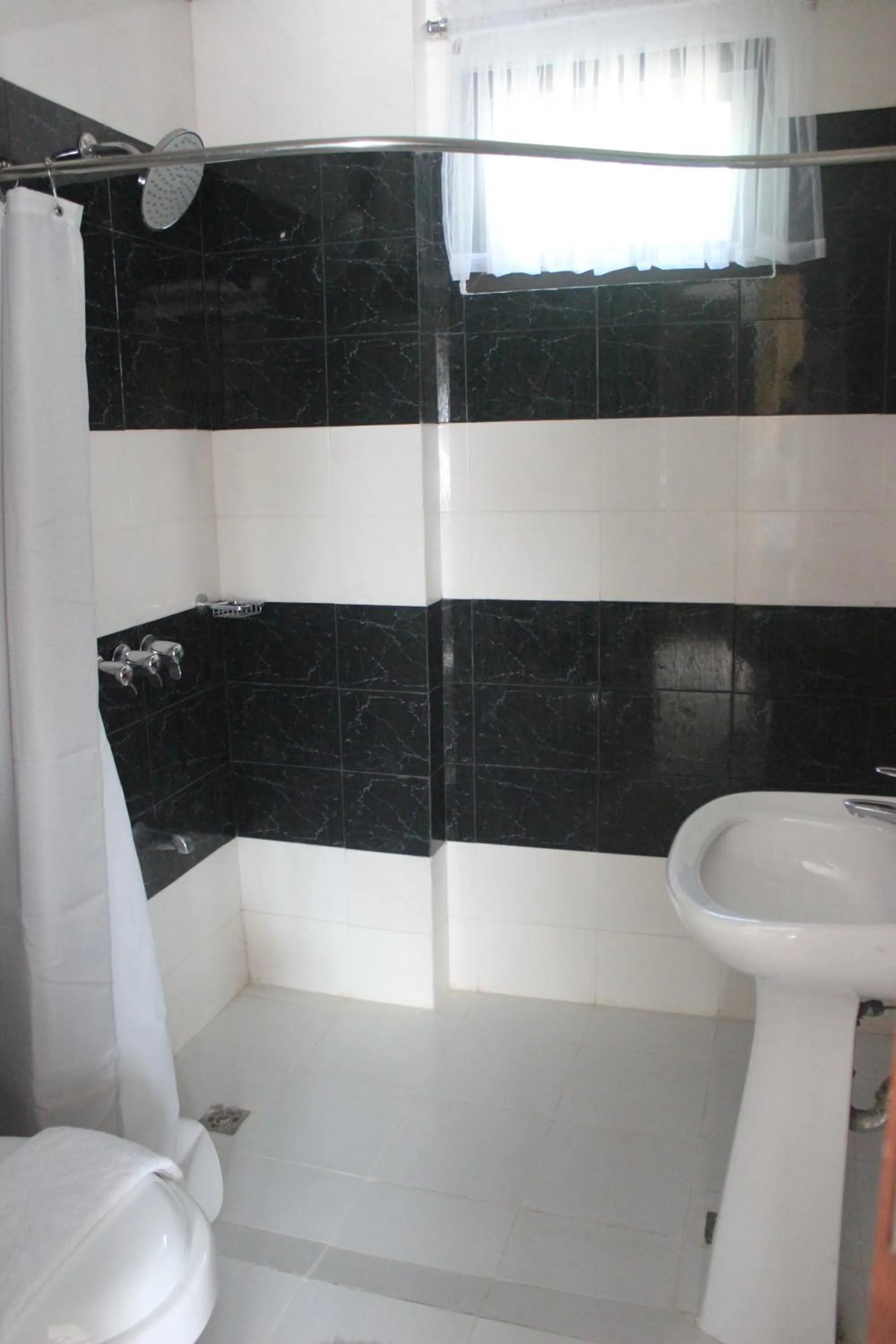 Bathroom in Veranda Suites and Restaurant