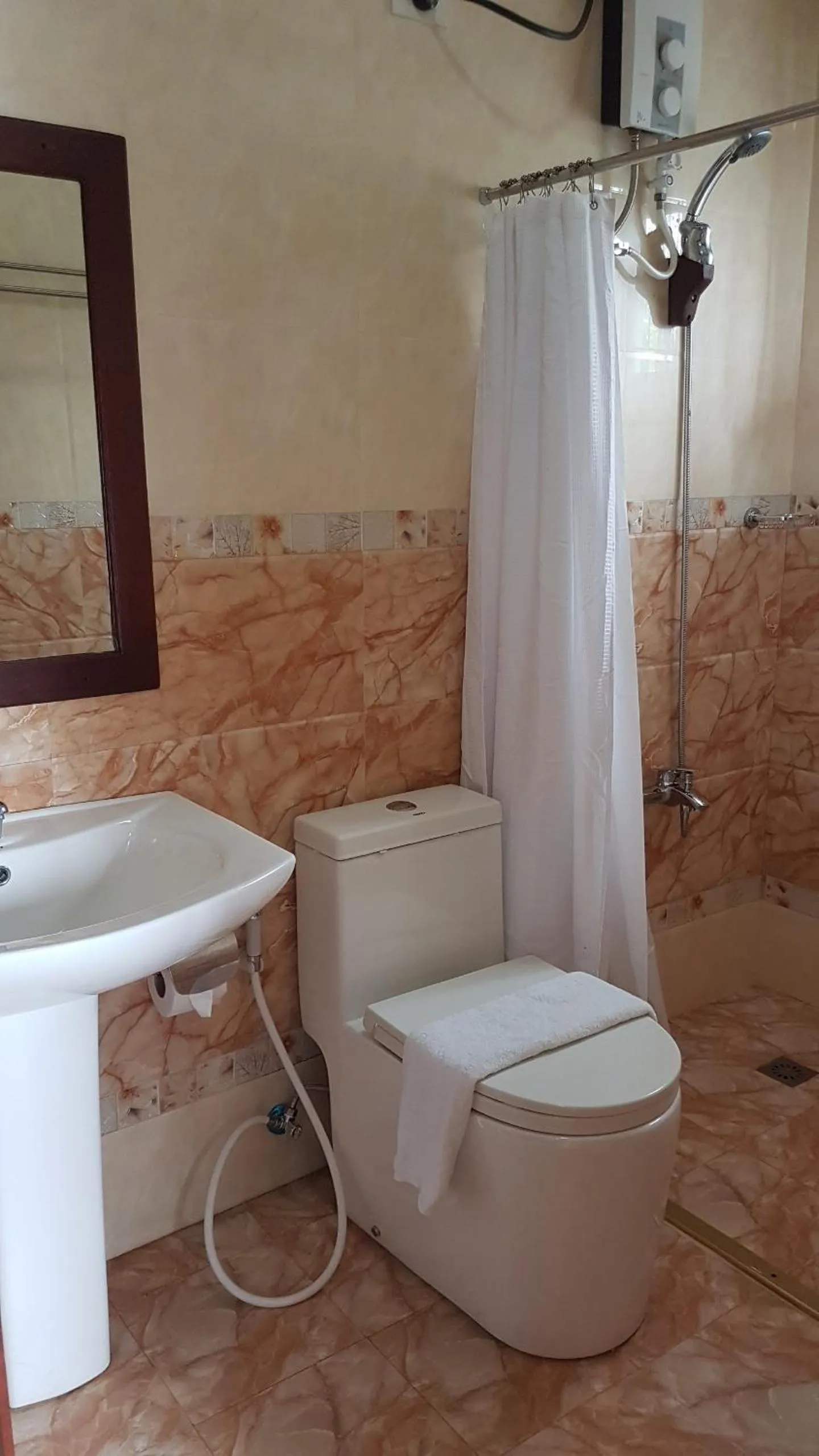 Bathroom in Veranda Suites and Restaurant