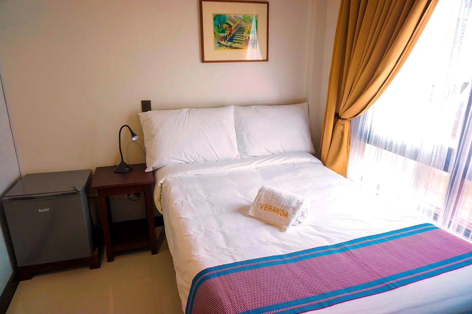 Bed in Veranda Suites and Restaurant