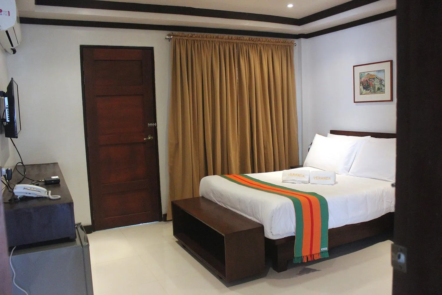 Bed in Veranda Suites and Restaurant