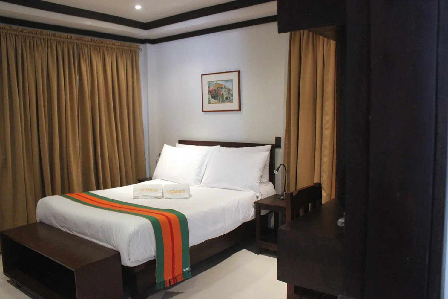 Bed in Veranda Suites and Restaurant