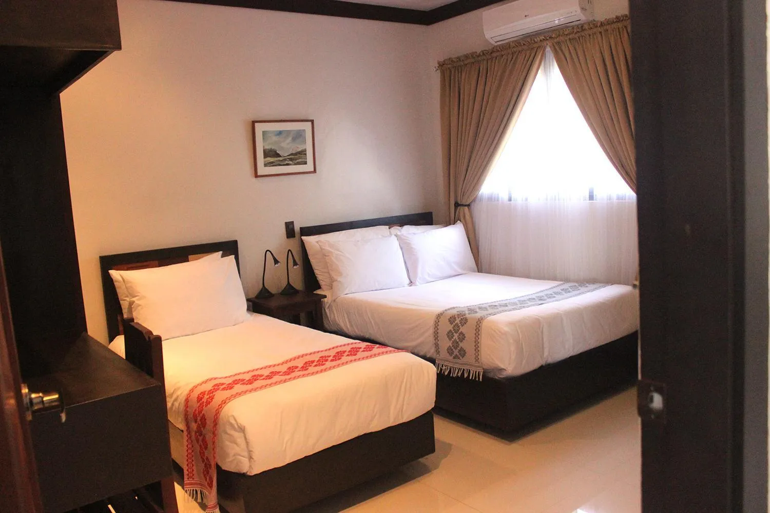 Bed in Veranda Suites and Restaurant