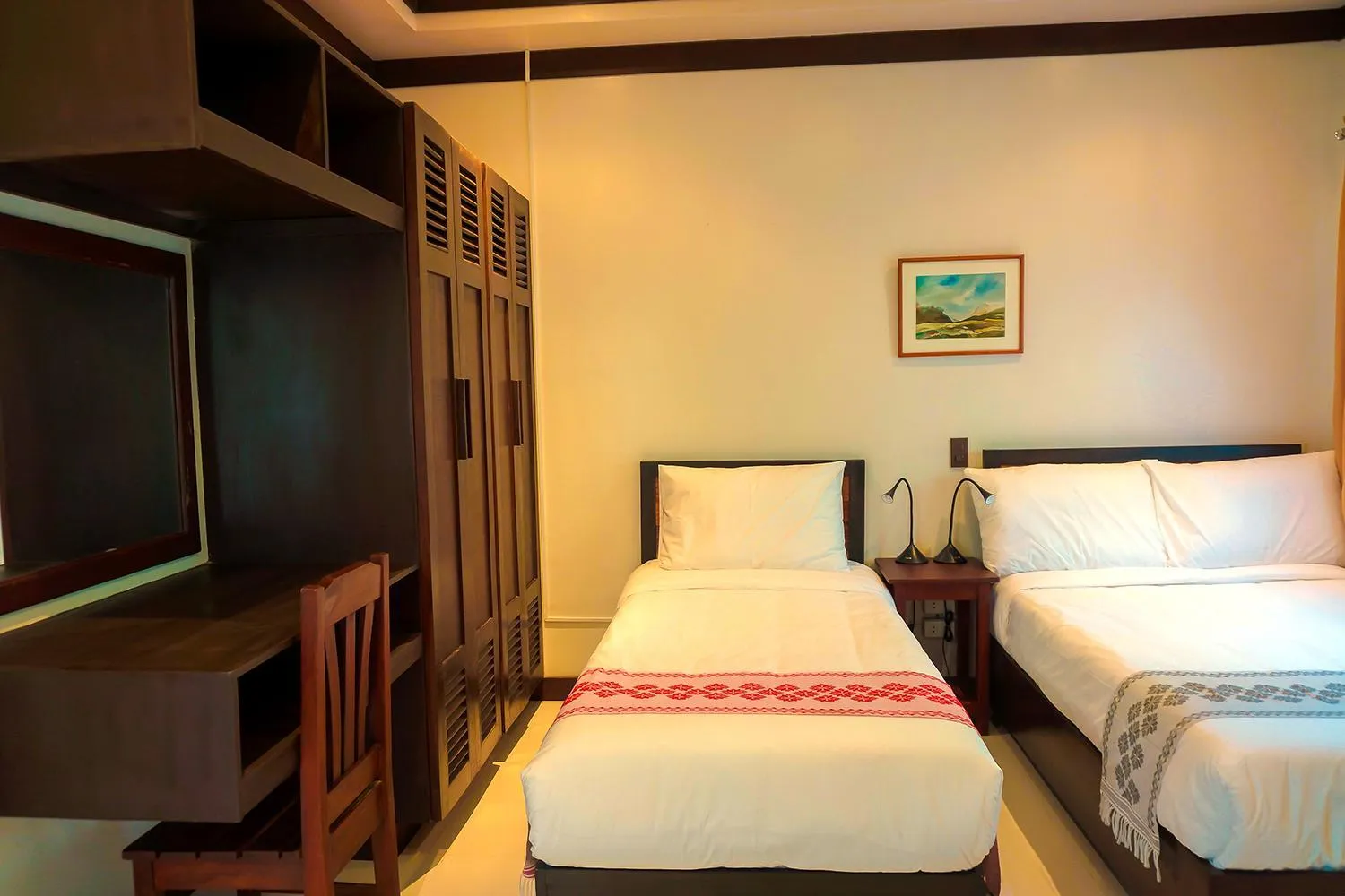 Bed in Veranda Suites and Restaurant